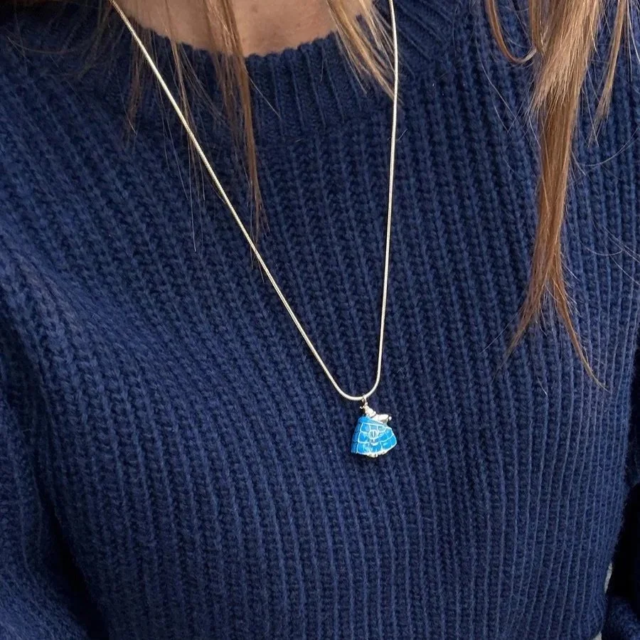 New BaubleBar Peanuts Snoopy Puffer Jacket Collection