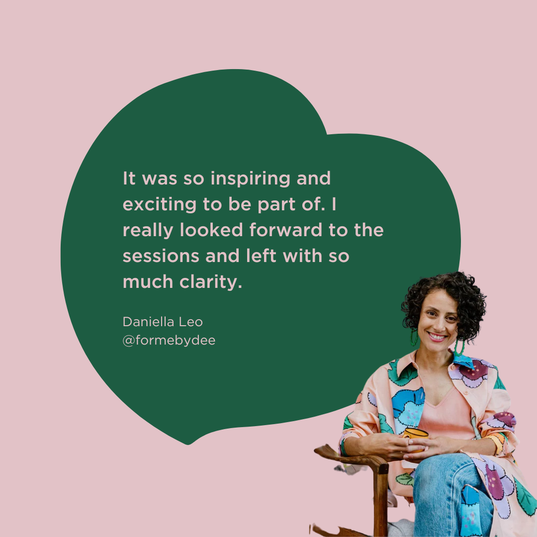 A woman with curly black hair sitting in a wooden chair, wearing a colorful floral blazer over a pink shirt and light blue jeans, smiling, with a speech bubble containing a quote about inspiring sessions.