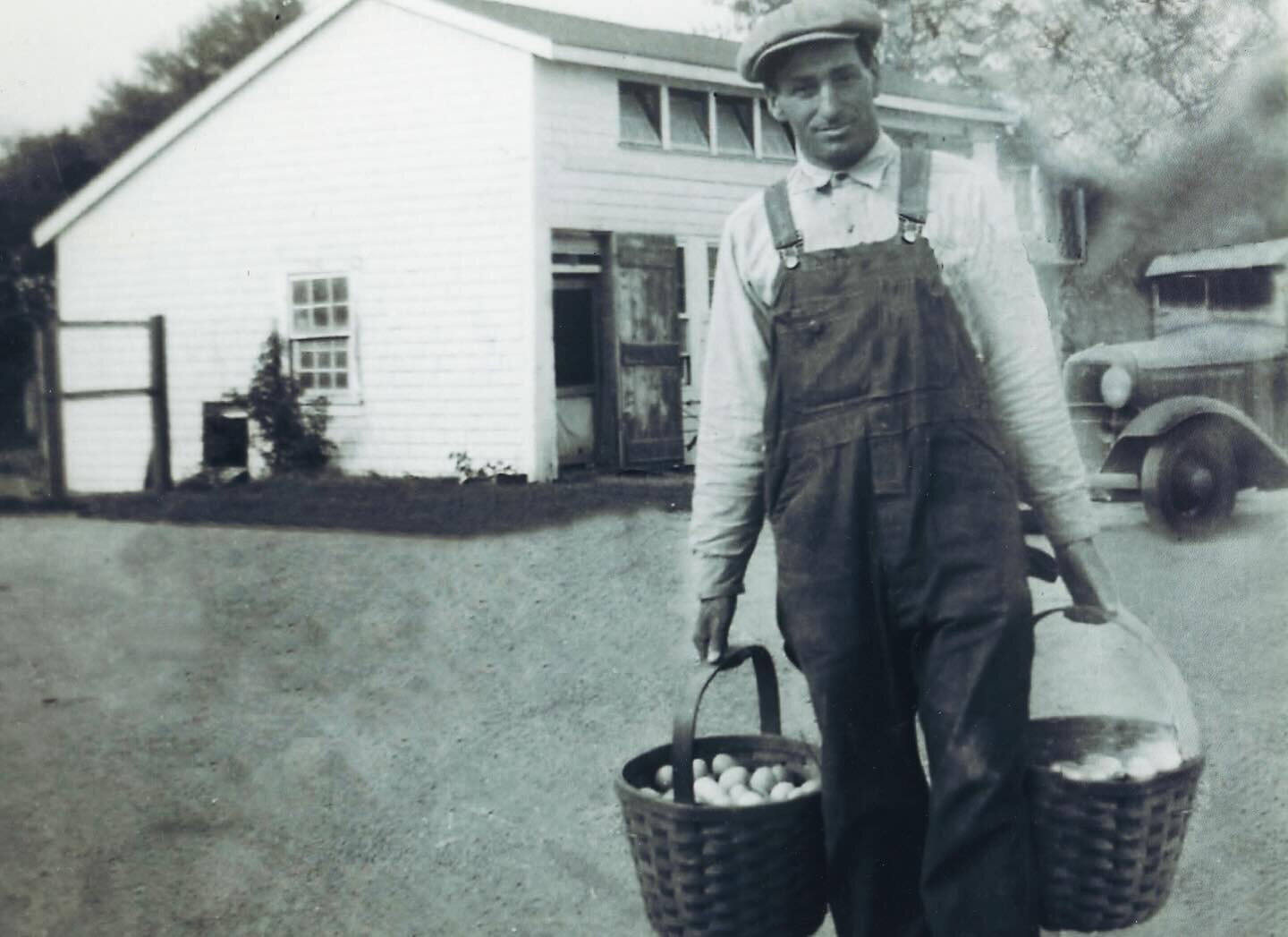 1941: John Bellefontaine carrying two baskets of eggs in front of his Bellefontaine&rsquo;s Chicken Farm, once located at 159 Beechwood Street. 🐣 The picture of a gentleman farmer with his buttoned to the top shirt and woolen flat cap. One any Easte