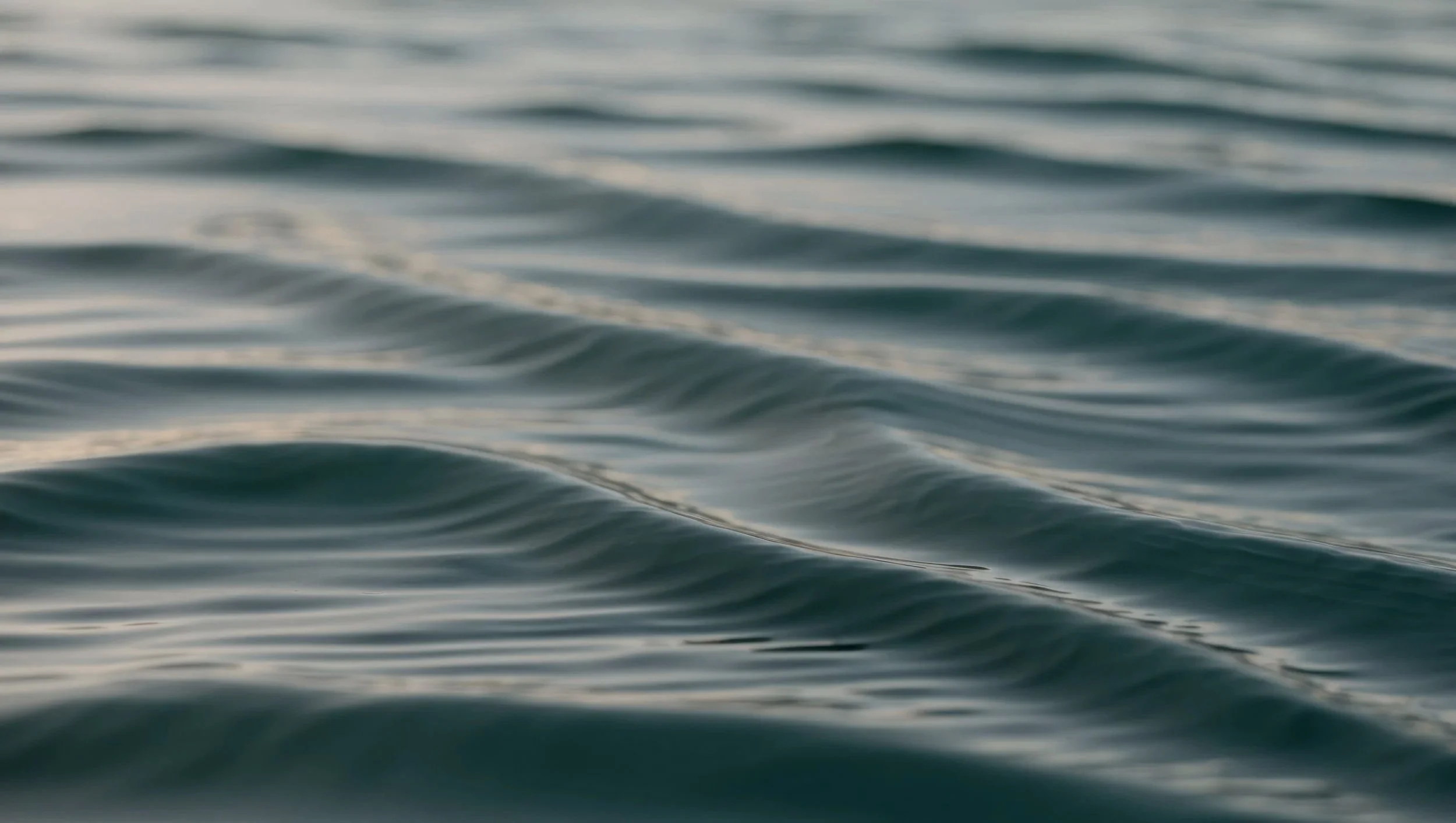 Close-up of calm ocean water with gentle ripples.