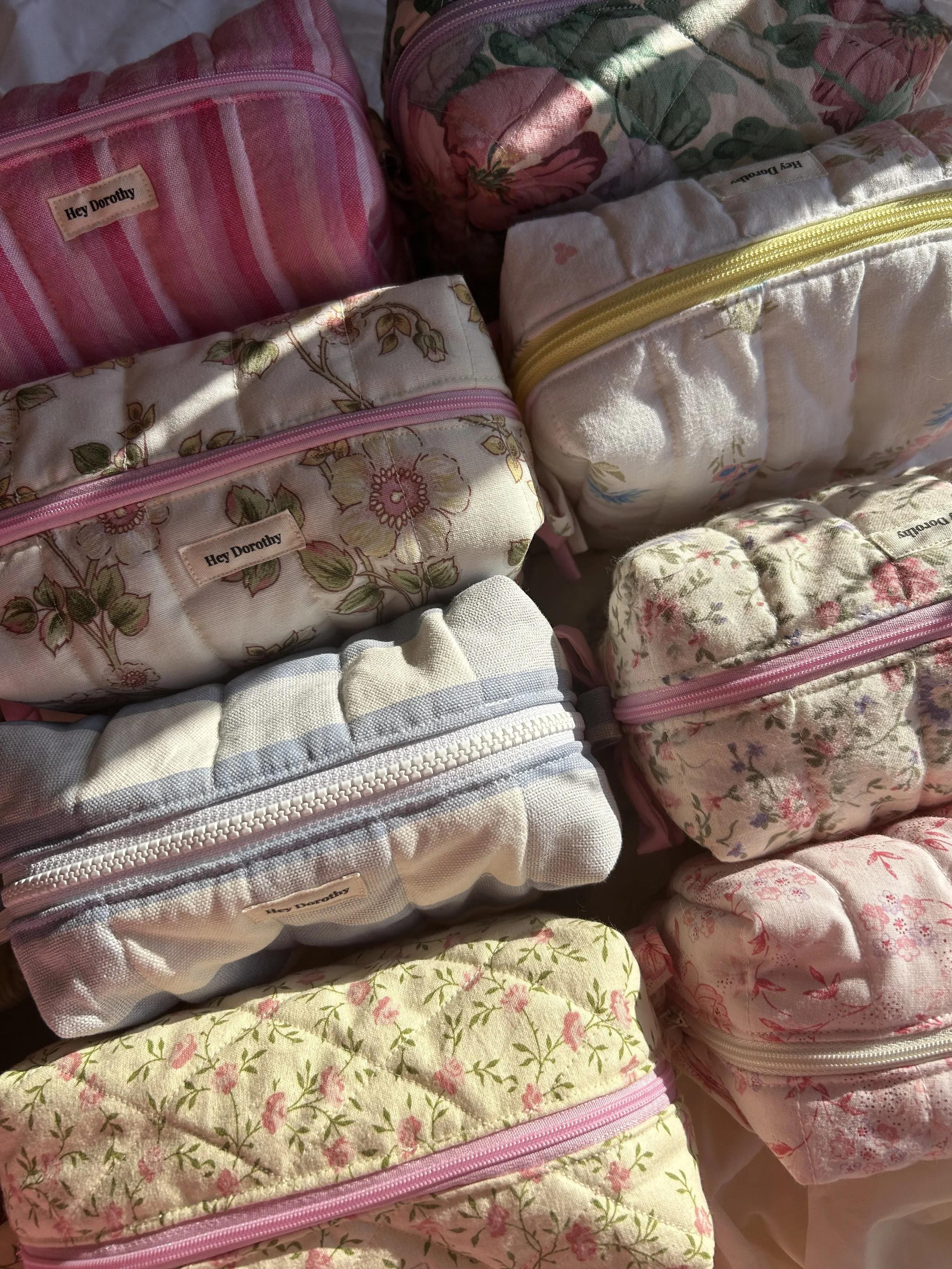 Vintage and upcycled fabrics become characterful bags and purses; locally sourced beads support another nearby small business. Every piece is made with love and independence. Shoppers pick sustainable, one-of-a-kind accessories that reduce waste, and