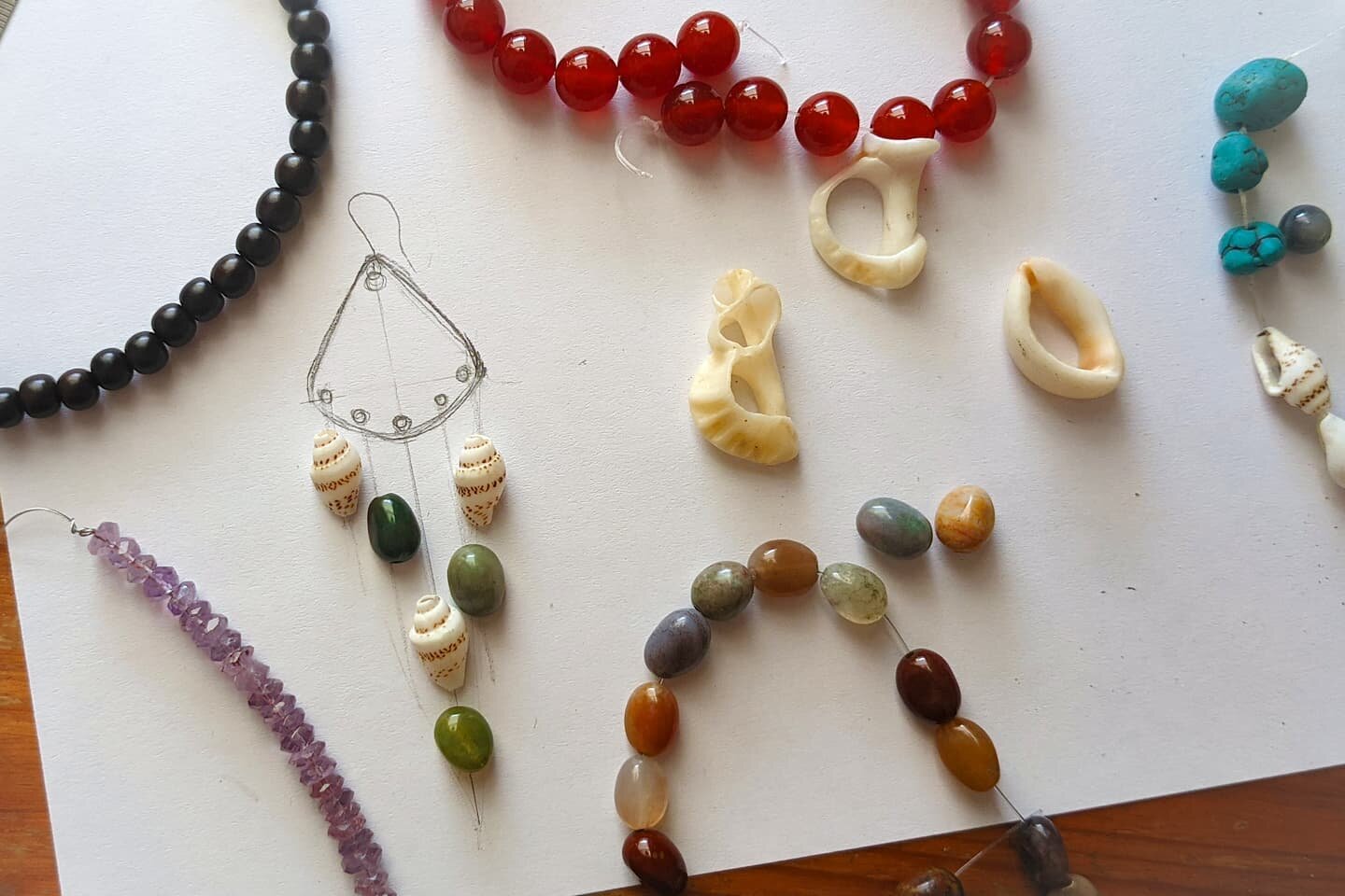 New earring in progress. Looking at what I already have, and what I should make/buy to make it happen. 

Most of the materials are either reclaimed or found. those tiny shells have been with me since 2006 in Greece. I think they might have finally fo