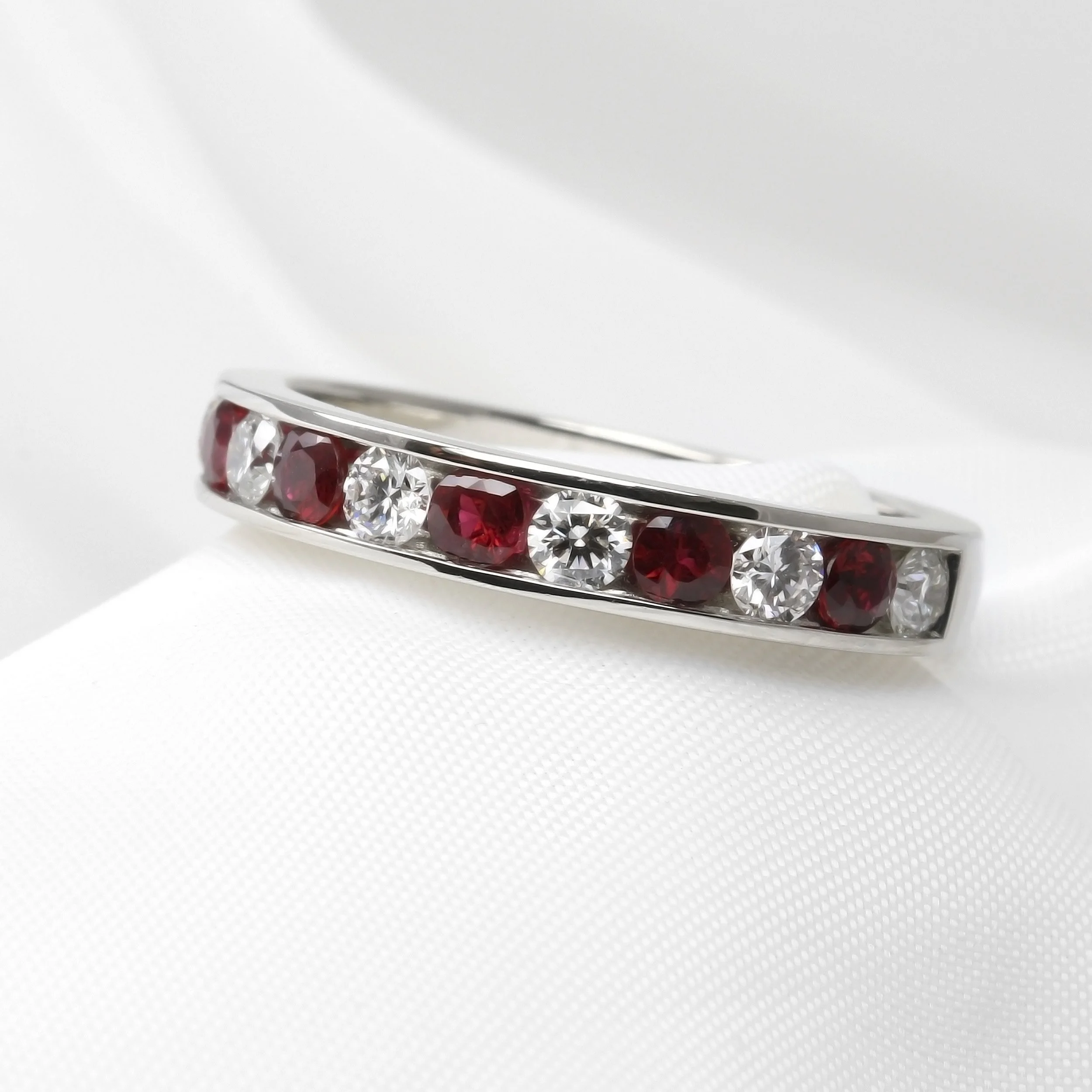  Channel Set Ruby and Diamond Half Eternity Ring 