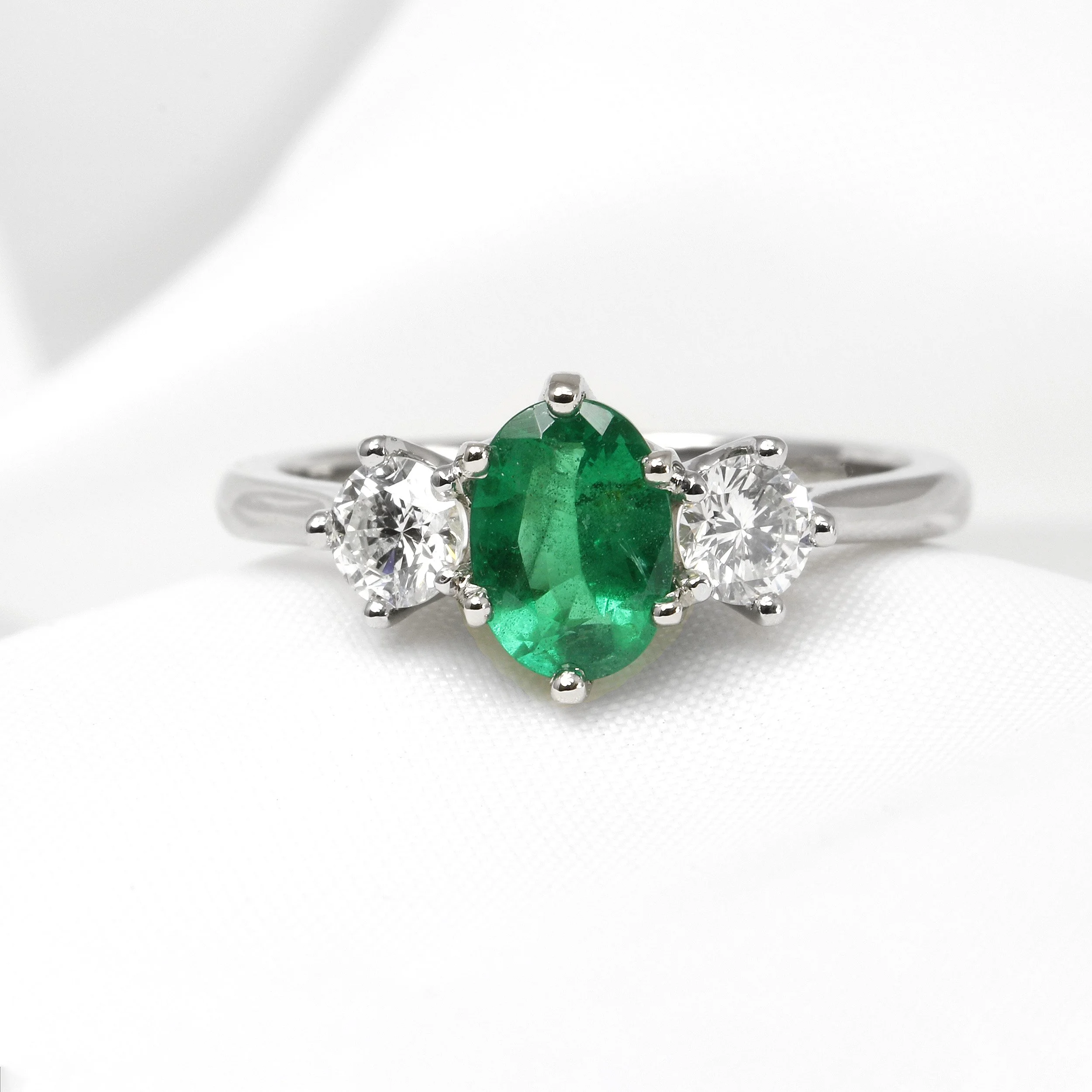  Timothy Roe Emerald and Diamond Three Stone Ring in Platinum £3,495.00 
