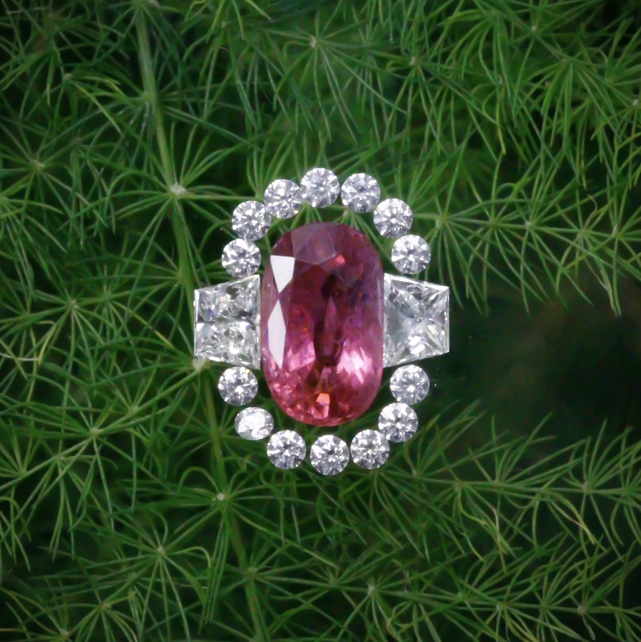 Pink-Red Ruby 1.69ct and Round 0.28ct and Trapeze 0.30ct cut Diamond cluster. 