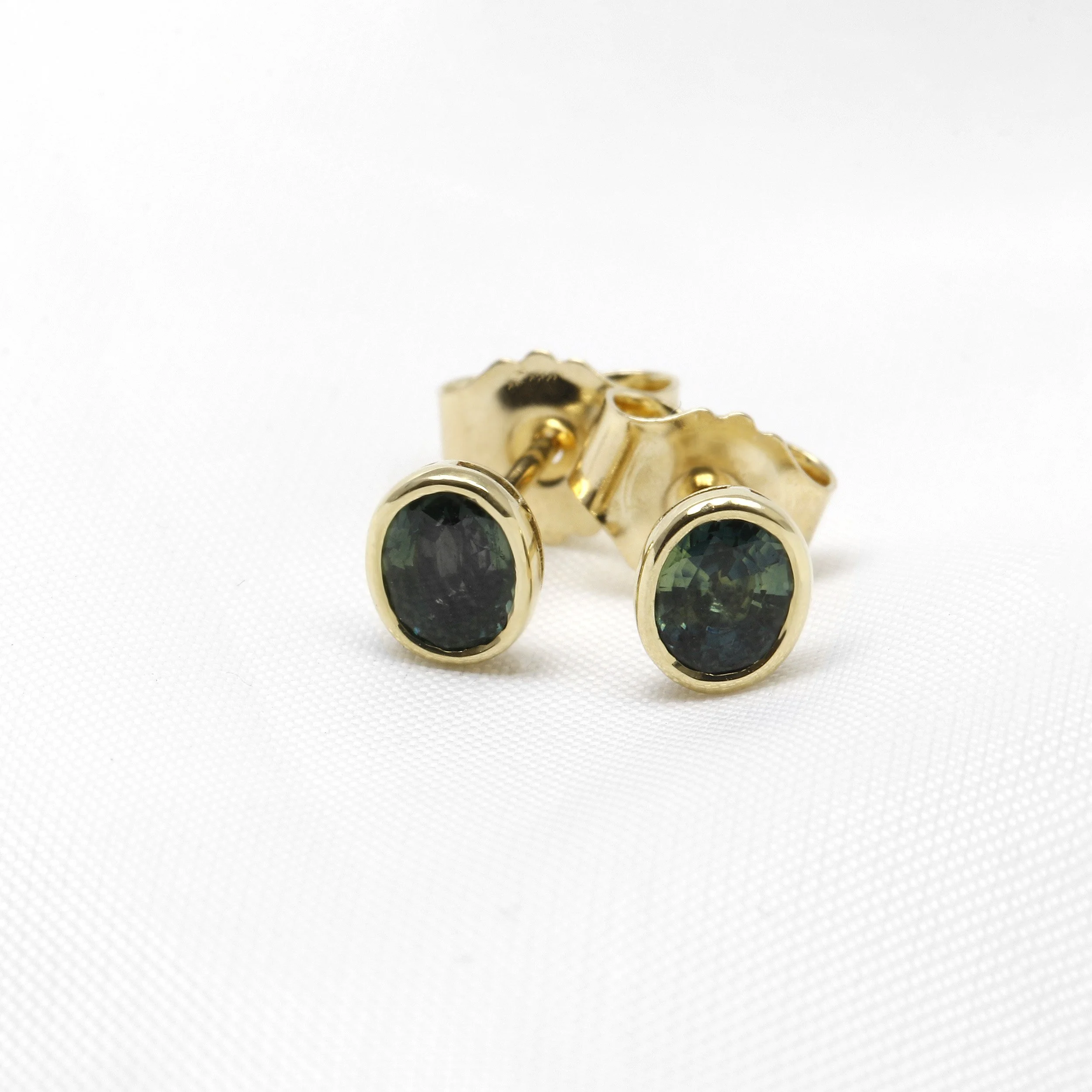  Teal Sapphire Stud Earrings in Yellow gold £425.00 