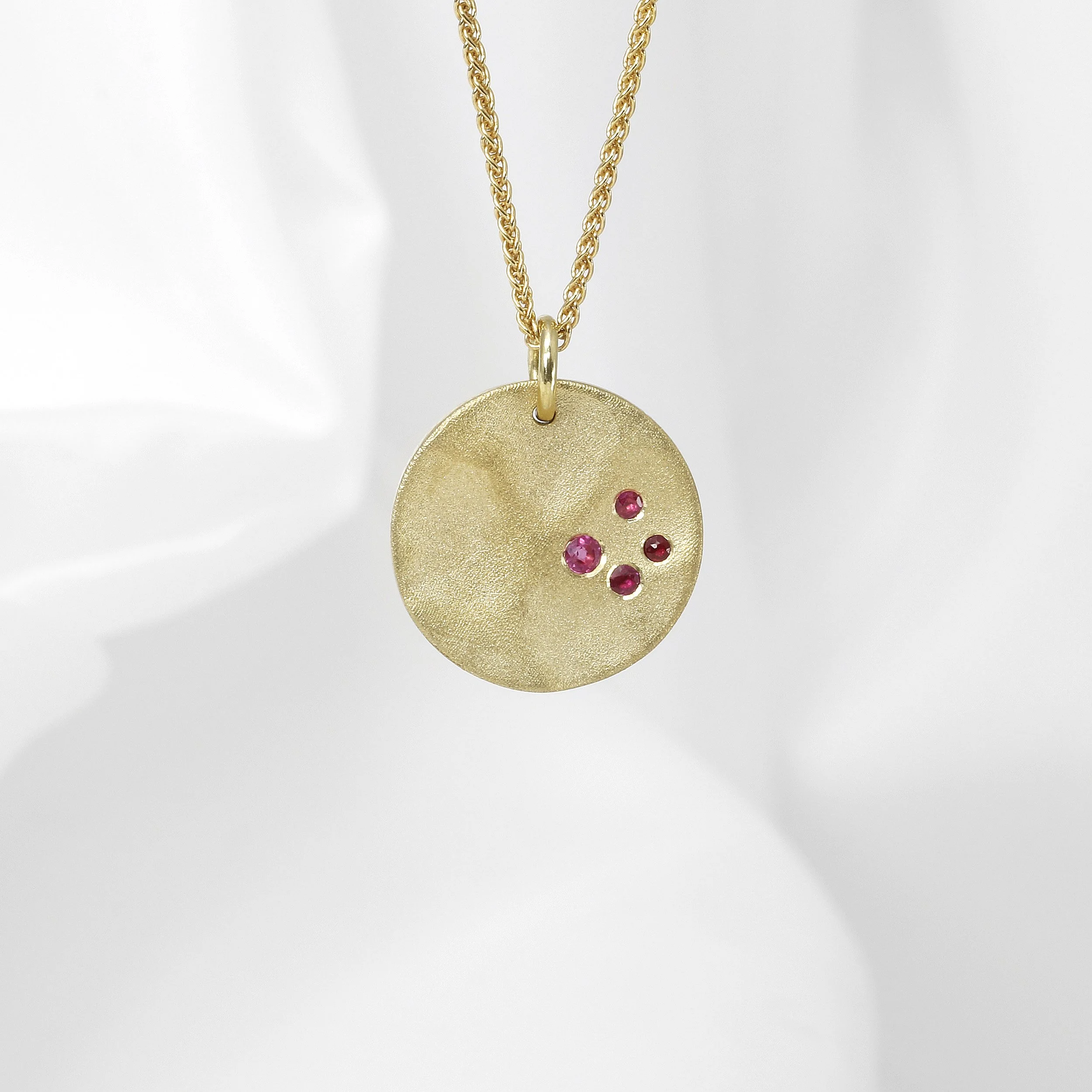  Medium Molten Disk Pendant with Pink Sapphires £650.00 