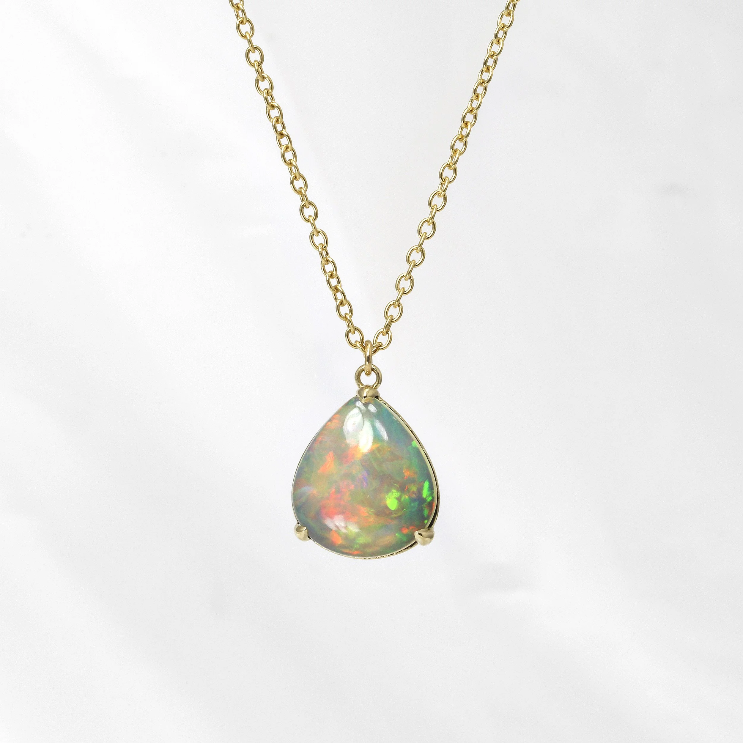 Pear Shape Opal Pendant in 9ct Yellow Gold