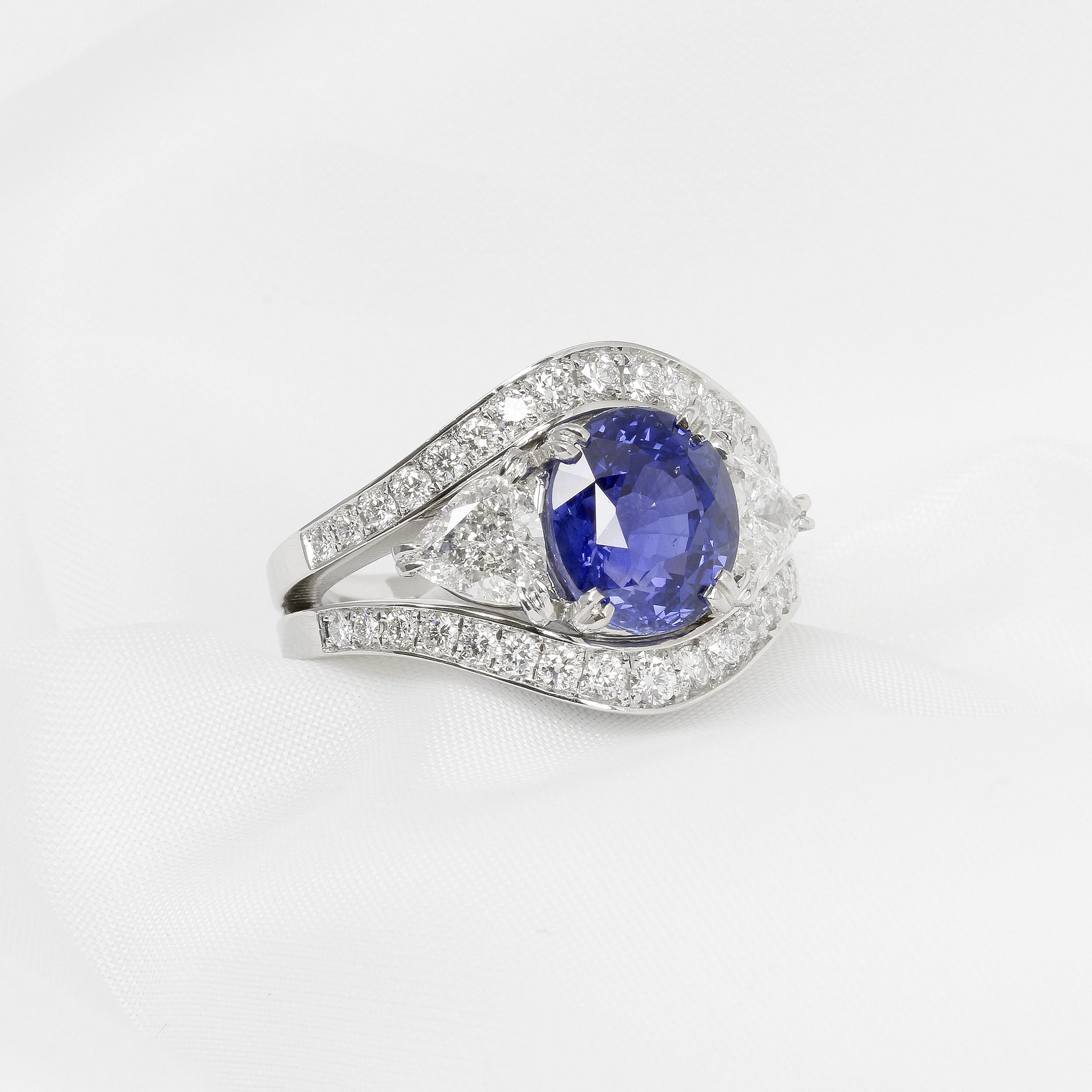  Blue Sapphire & Trilliant Cut Side Diamonds Ring in Platinum £14,995.00 