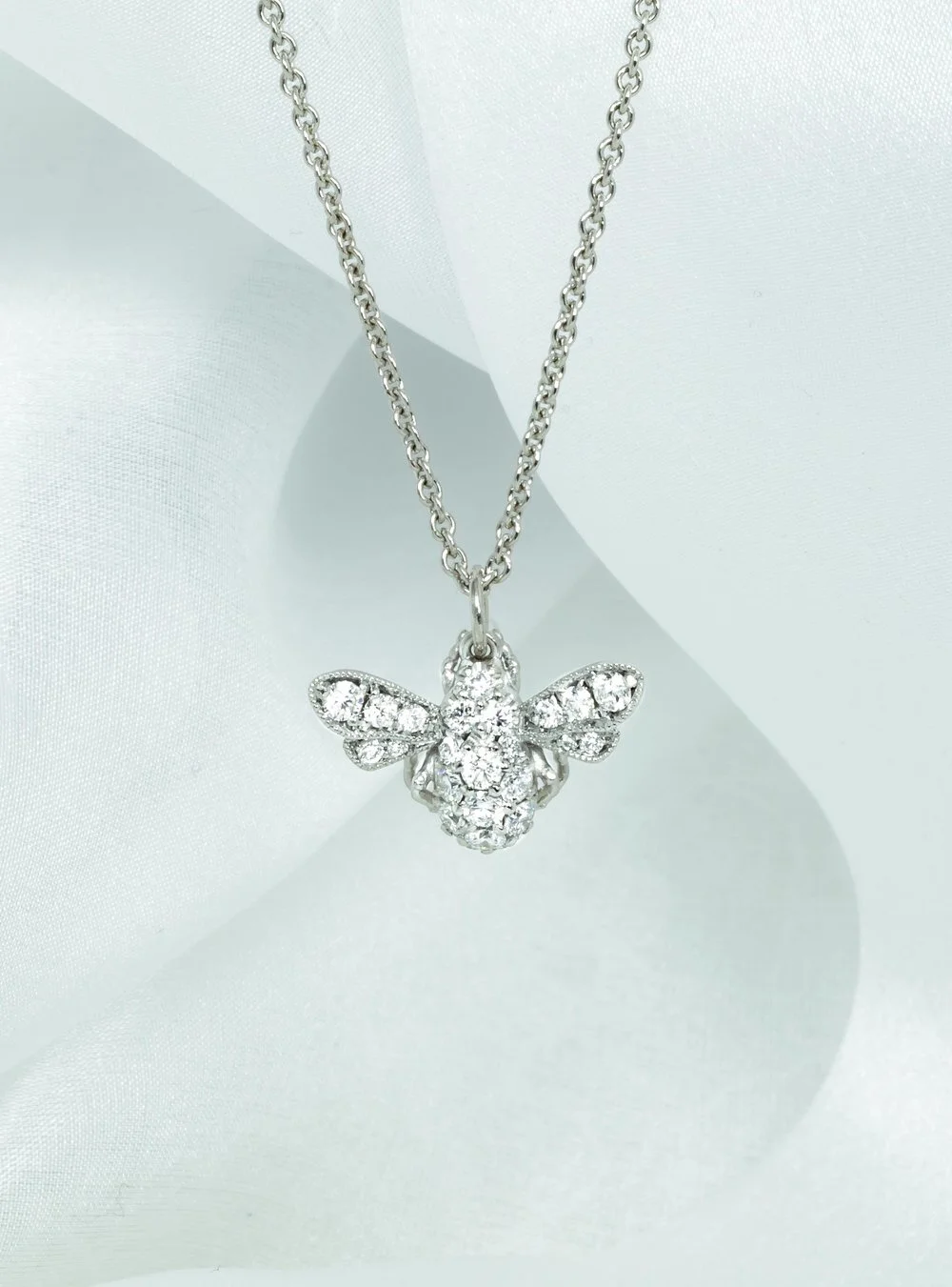  Platinum mounted, diamond set bee pendant. Made in Chichester, England. 