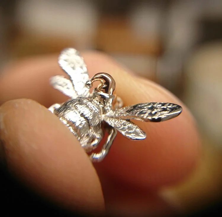  Our Christmas Bee! Solid White Gold with a Rose Gold hat and white pom-pom. 