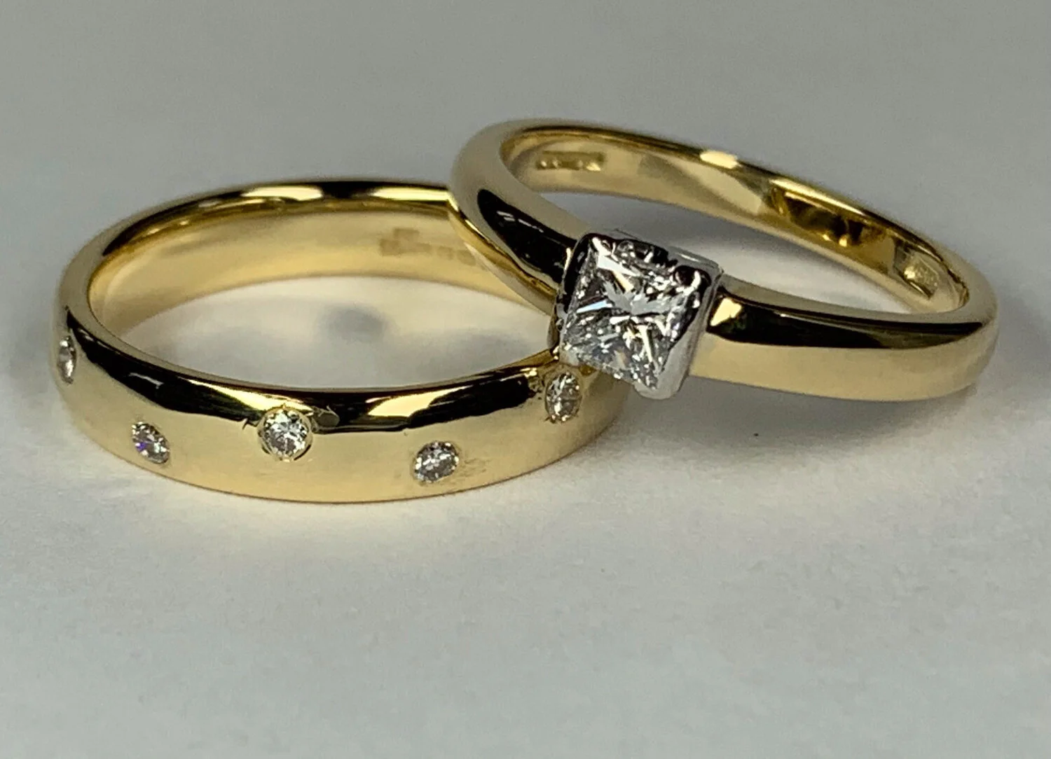  Image 4, 5 ands 6. Before and after shots of possibly the most evenly “hammered” finish on a ring that we have seen. The solitaire had only a few marks near the diamond but the rest of the ring was covered. There is one impression near the diamond that is very clear and shows possibly the corner of another princess cut diamond and the L-shaped claw that held its corner (see close up image). We were able to re-finish the surface with careful re-surfacing and polishing to an almost new condition. 