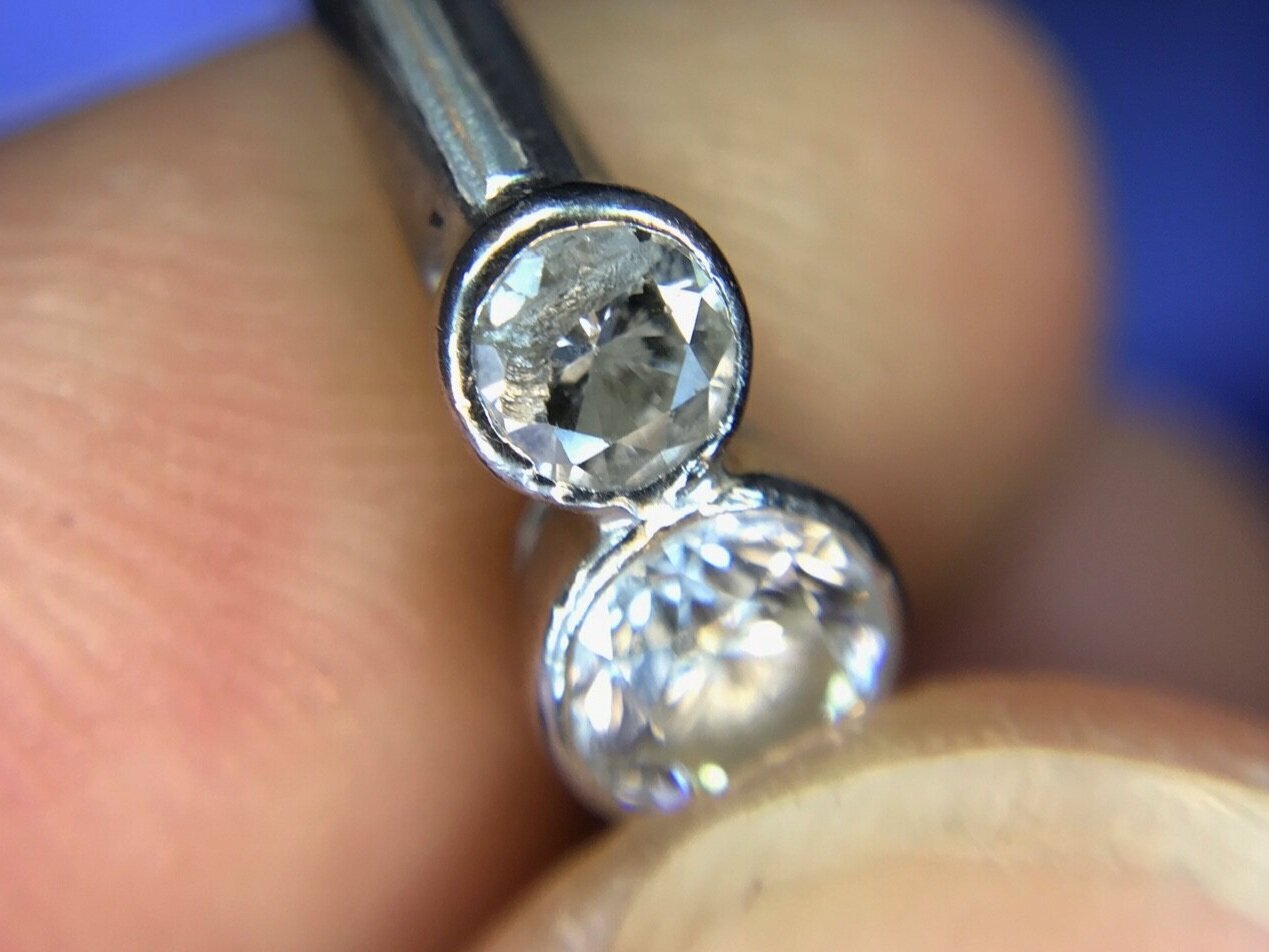  Image 15. No sign of any impact marks on the edge of the setting but the diamond has broken along the top edge most likely from a direct random impact. 