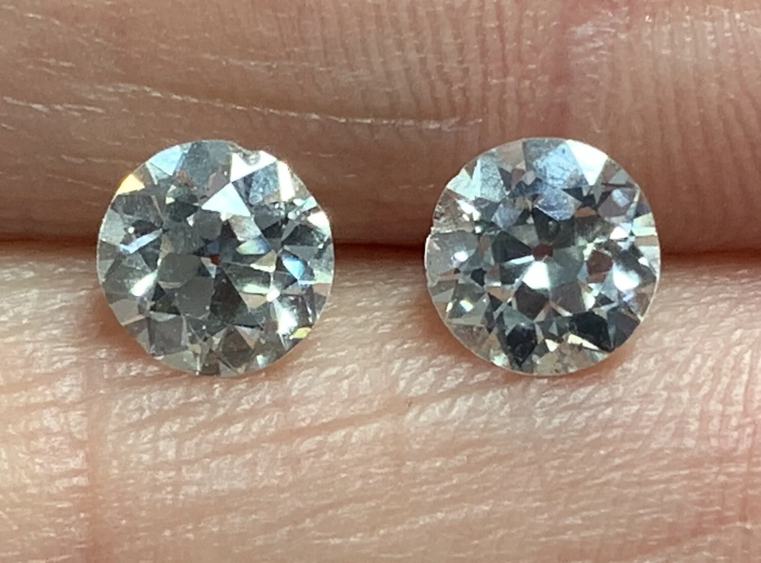 Image 19. A pair of old European cut diamonds from a ring circa 1925. If you look carefully you can see some small chips on the girdle. These could be sent to a diamond cutter to remove the chips but of course the diameter and the weight of the stone would be reduced. 