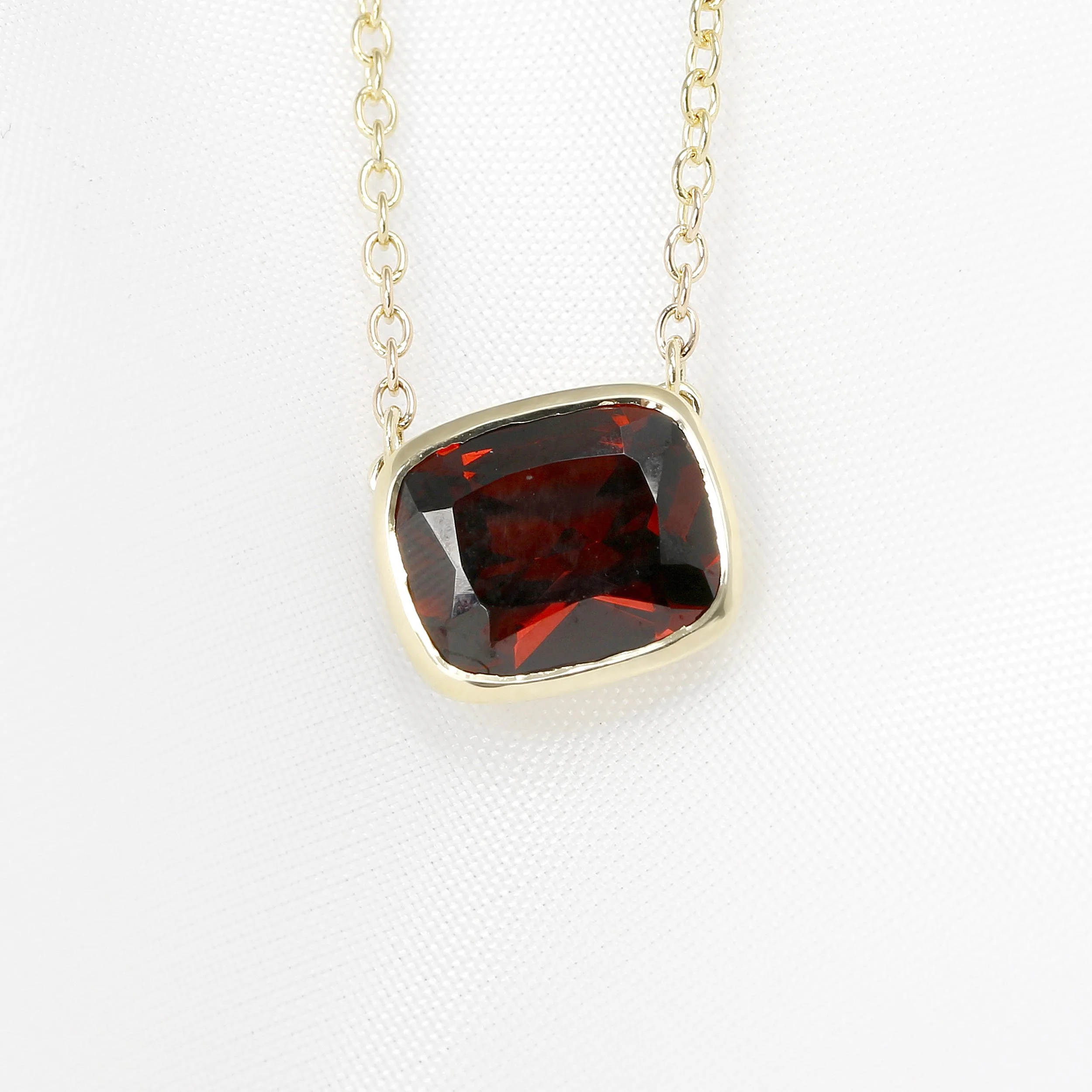  Yellow Gold Garnet Pendant £715.00 