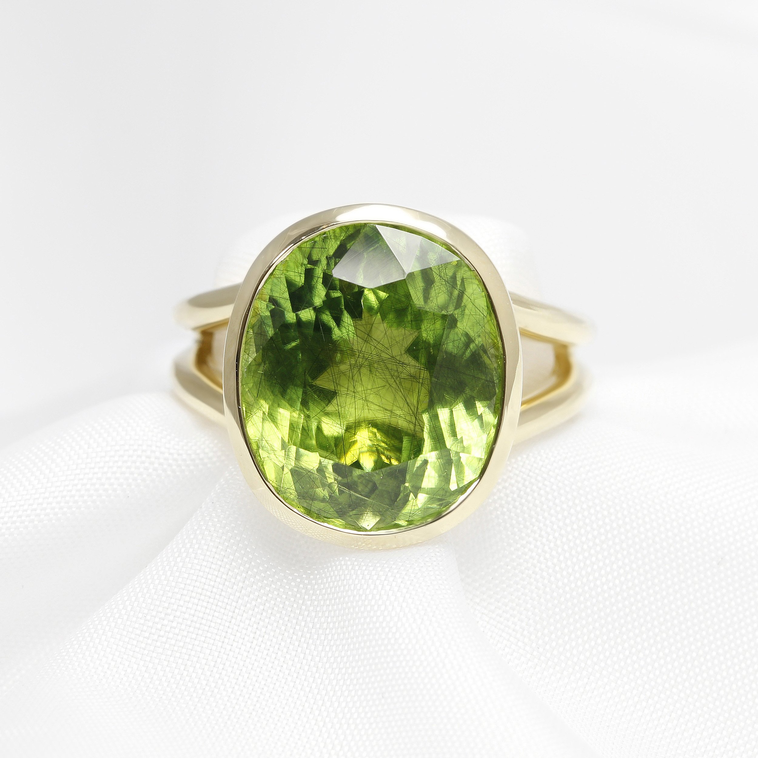  Peridot with Ludwigite Inclusions Dress Ring in 9 ct Yellow Gold £2,850.00 