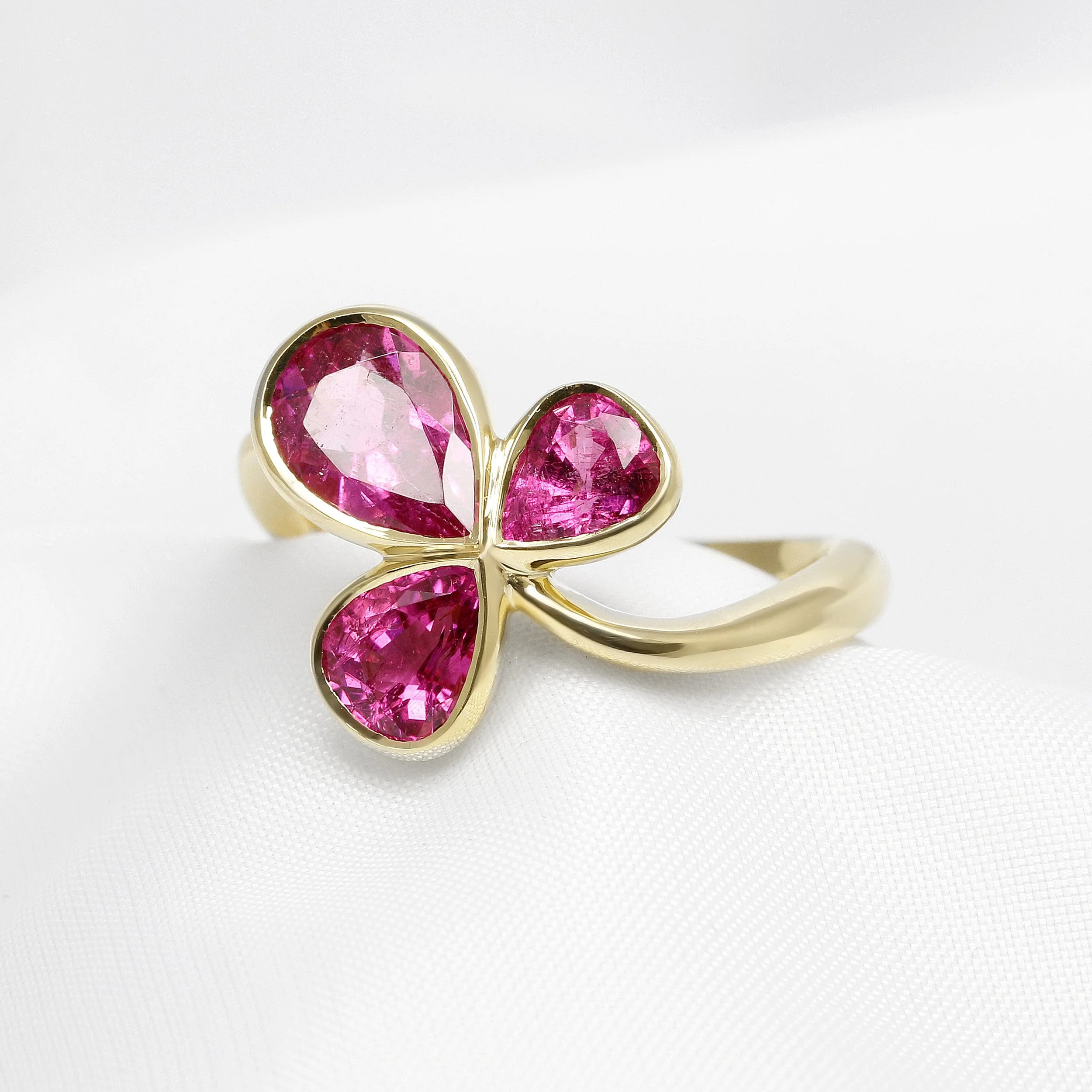  Pink Tourmaline Three Stone Ring in Yellow Gold £1,750.00 