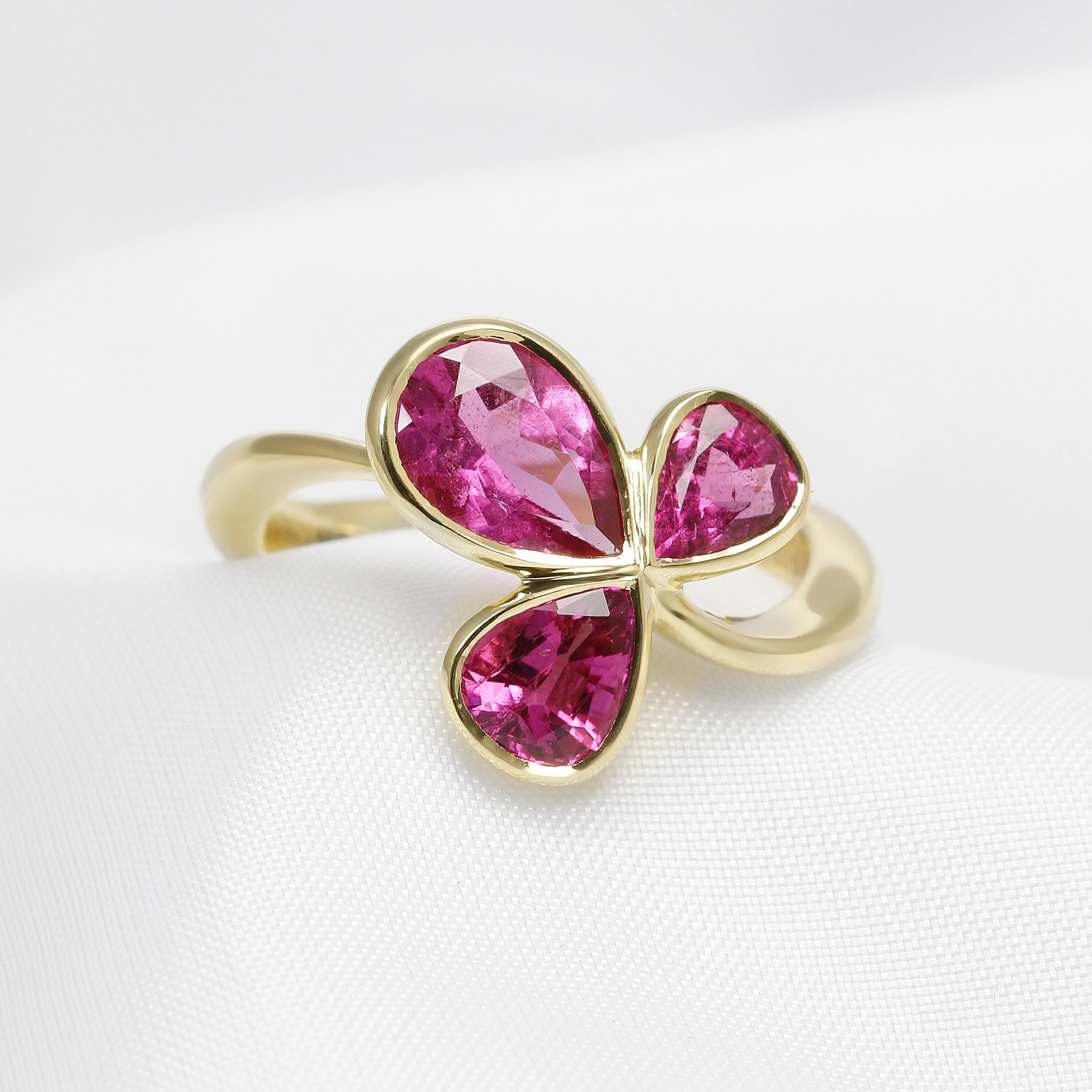  Pink Tourmaline Three Stone Ring in Yellow Gold £1,750.00 