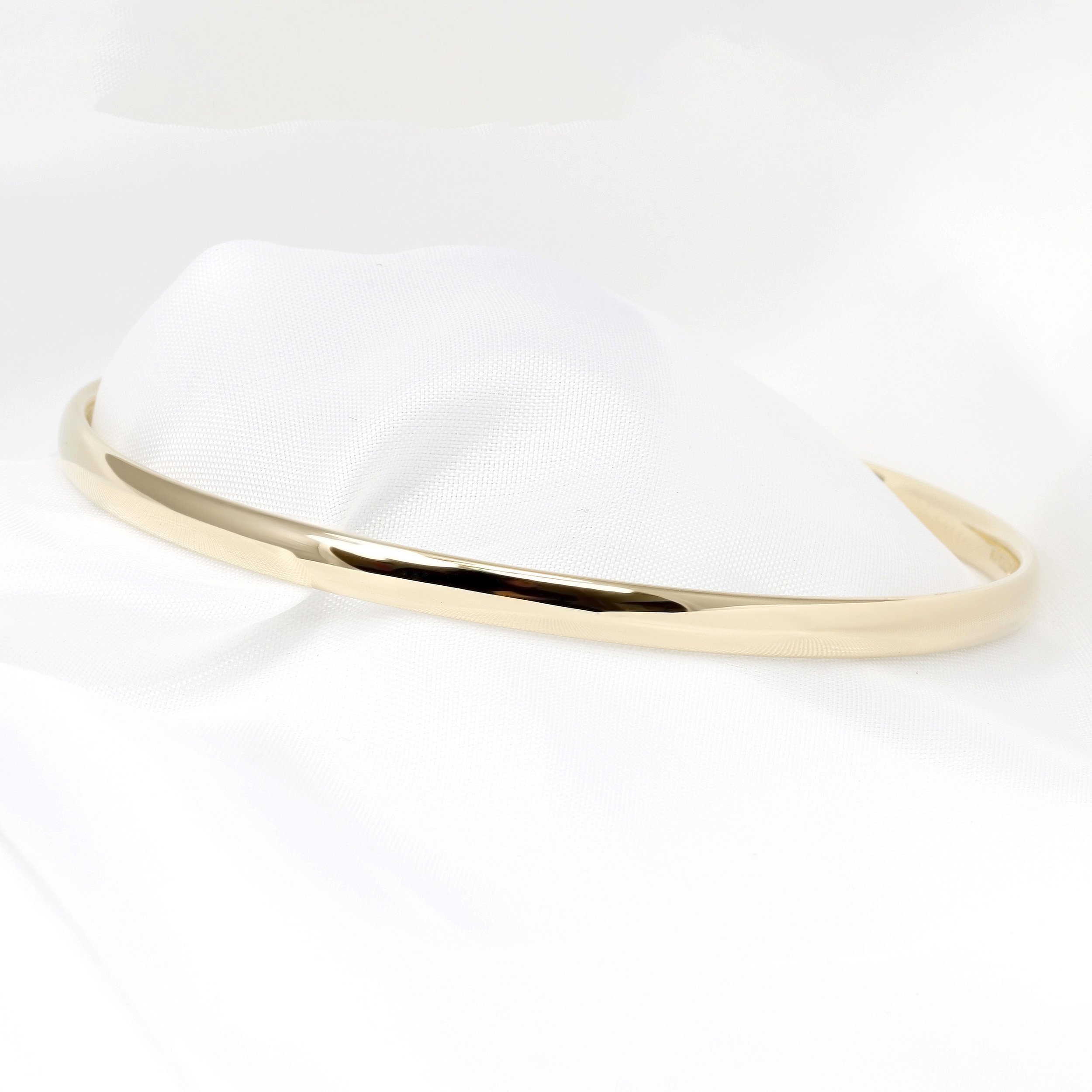   Quiet luxury: simple but stunning Court Yellow Gold Bangle at Timothy Roe Fine Jewellery  