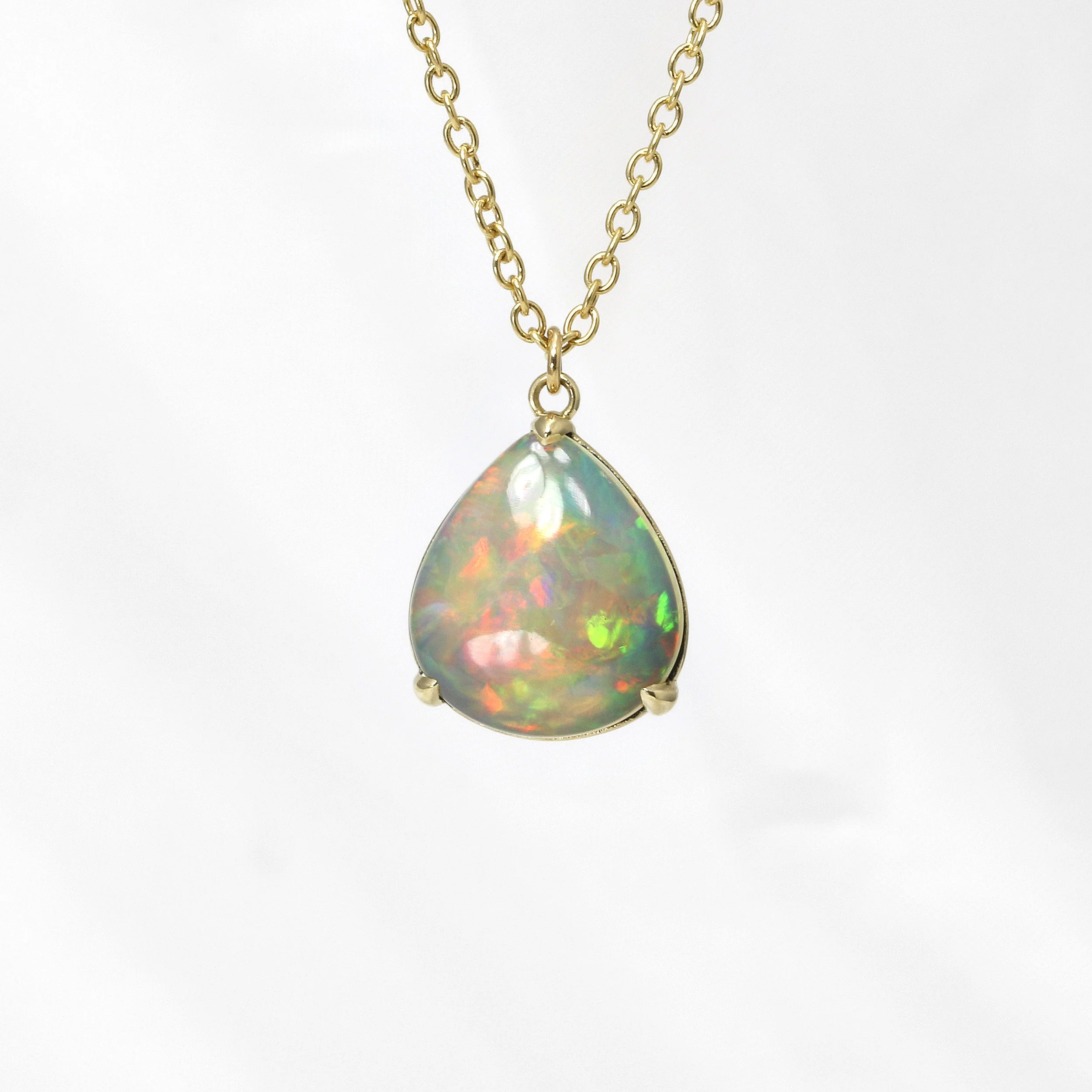 Pear Shape Opal Pendant in 9ct Yellow Gold