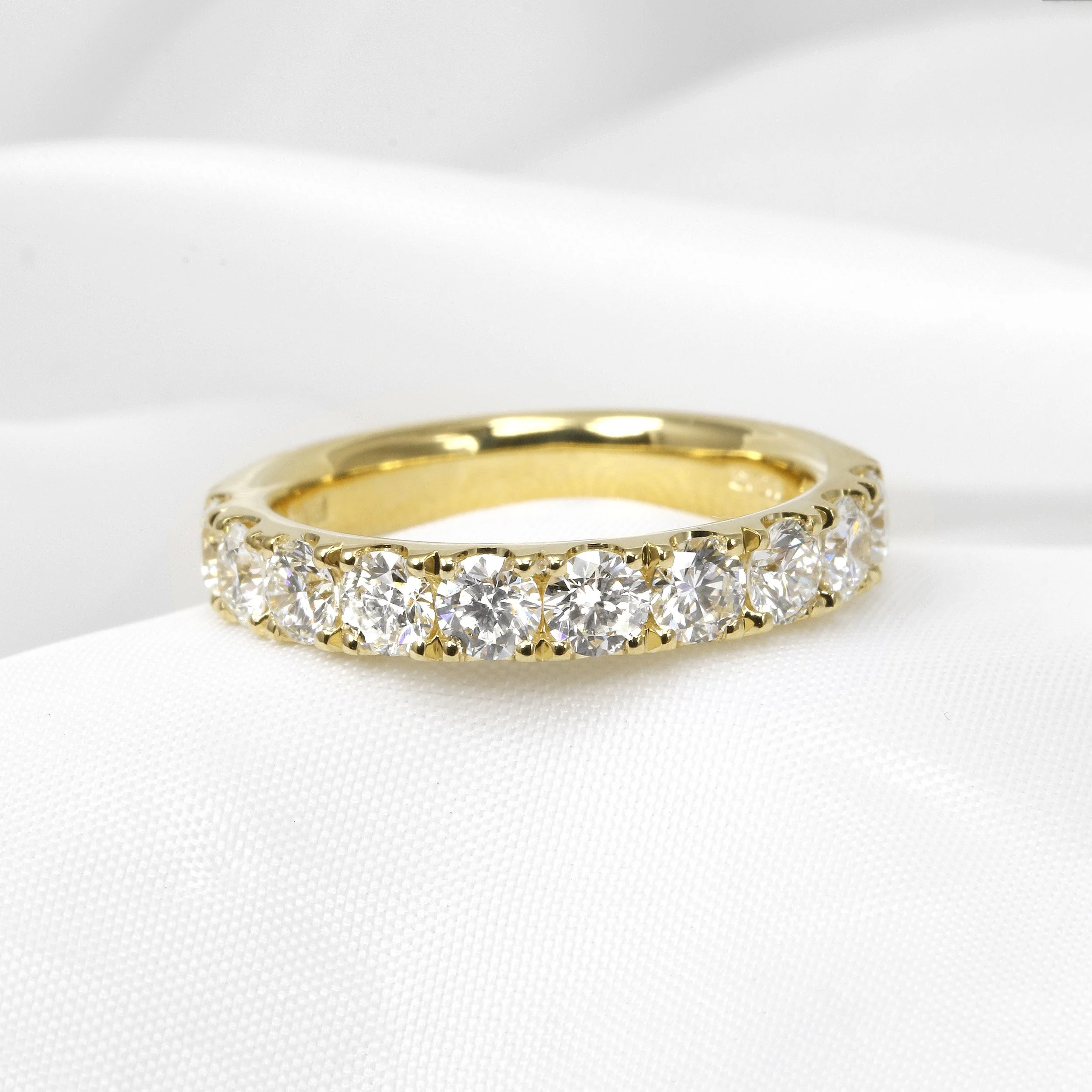 Cutaway Claw Set Diamond Eternity Ring in 18ct Yellow Gold