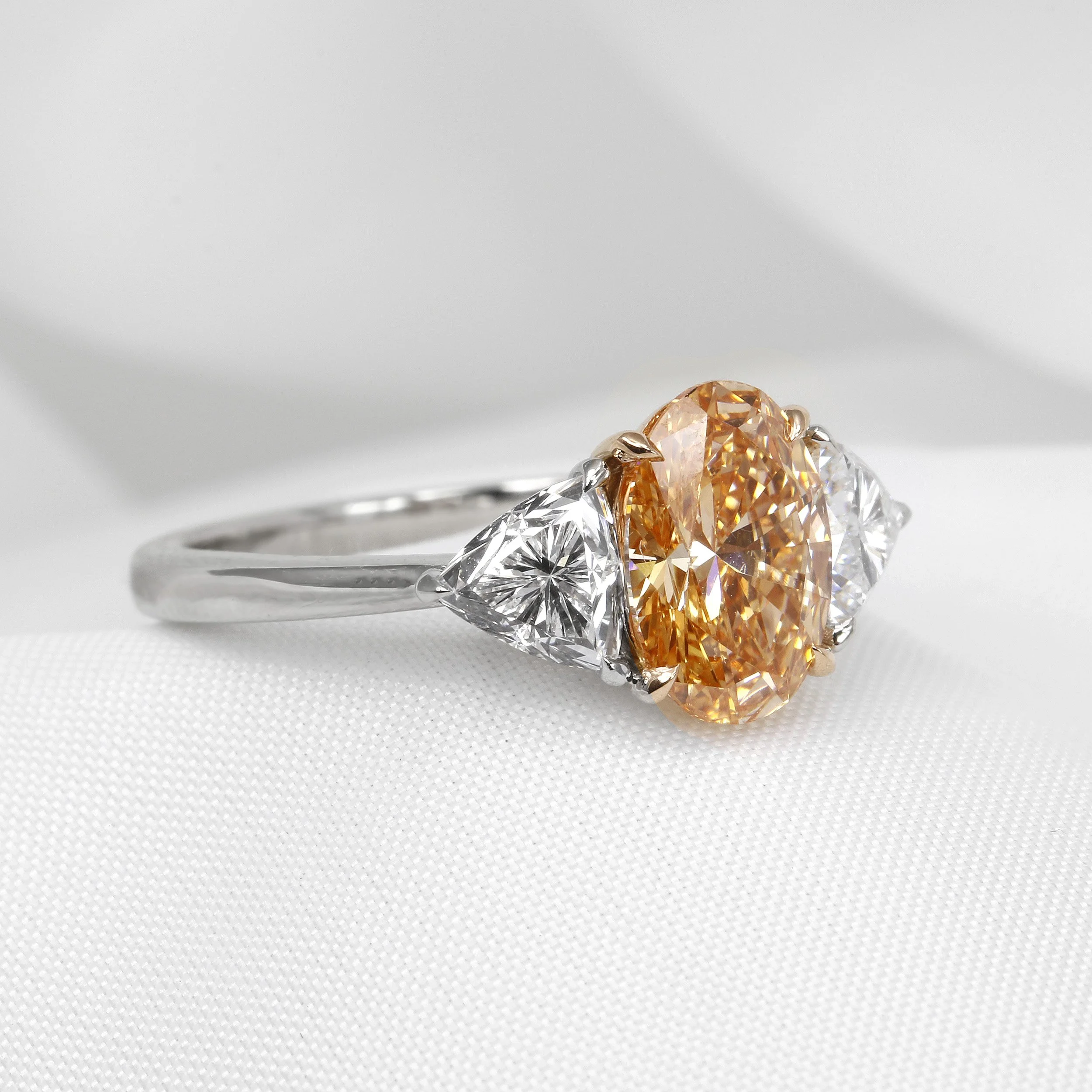 Timothy Roe Lab Created Peach Oval and Trilliant Cut Diamond Three Stone Ring £2,495.00 