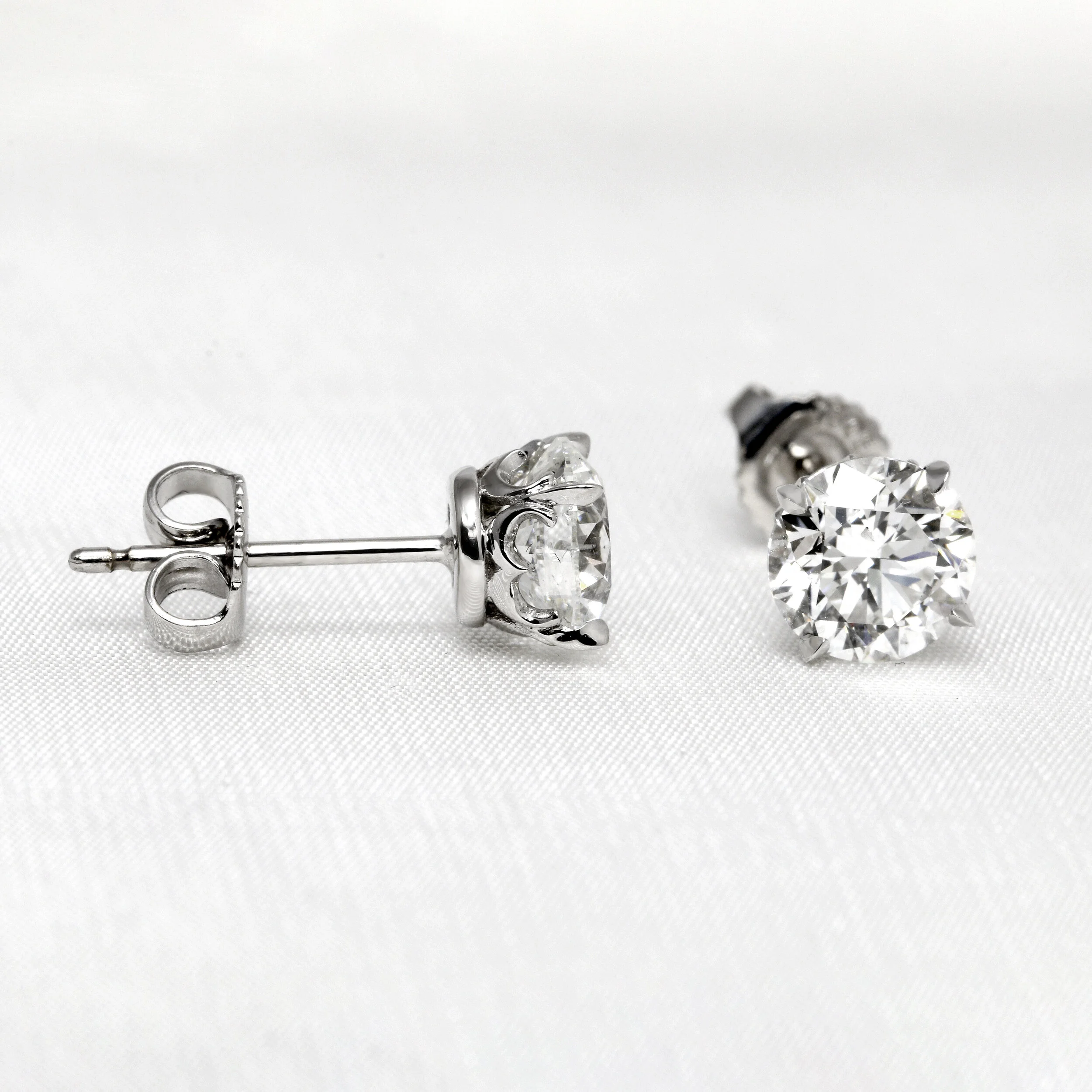  See our Collection of Diamond Solitaire Stud Earrings in 18ct White Gold 