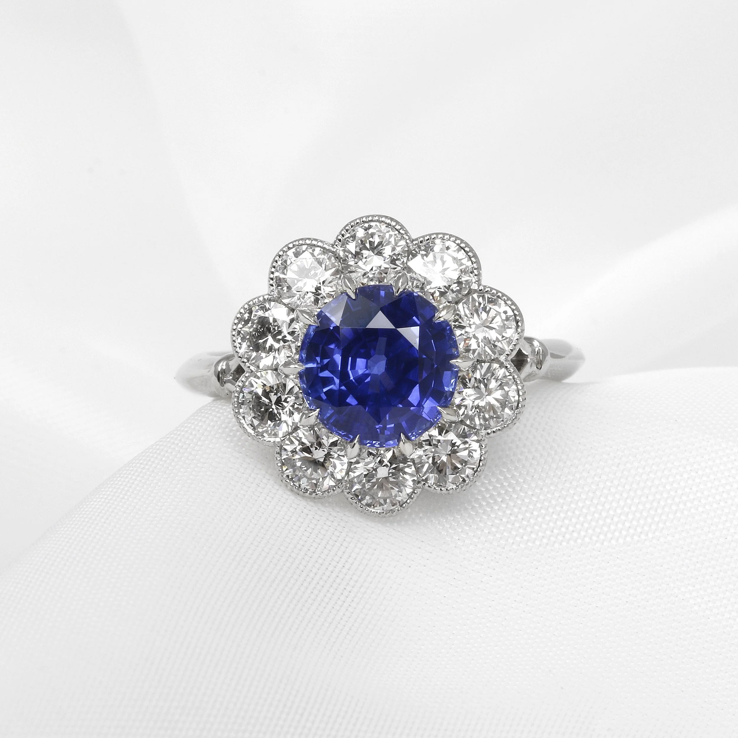  Timothy Roe Ceylon Blue Sapphire and Diamond Daisy Cluster Ring £13,495.00 