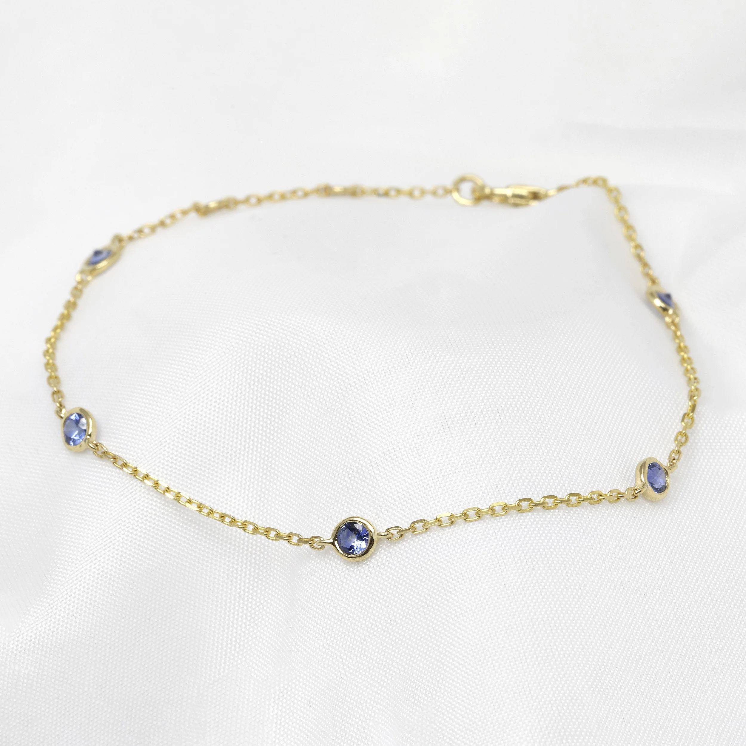  Sapphire Station Bracelet in Yellow Gold £330.00 