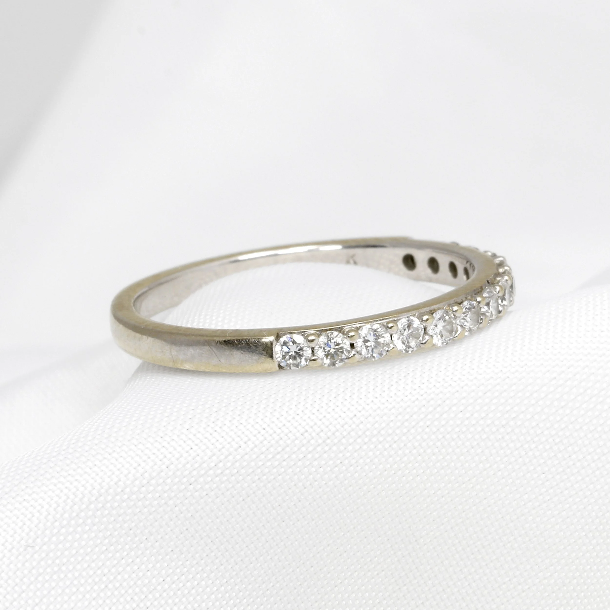  White gold half eternity ring before clean, polish and rhodium plating  