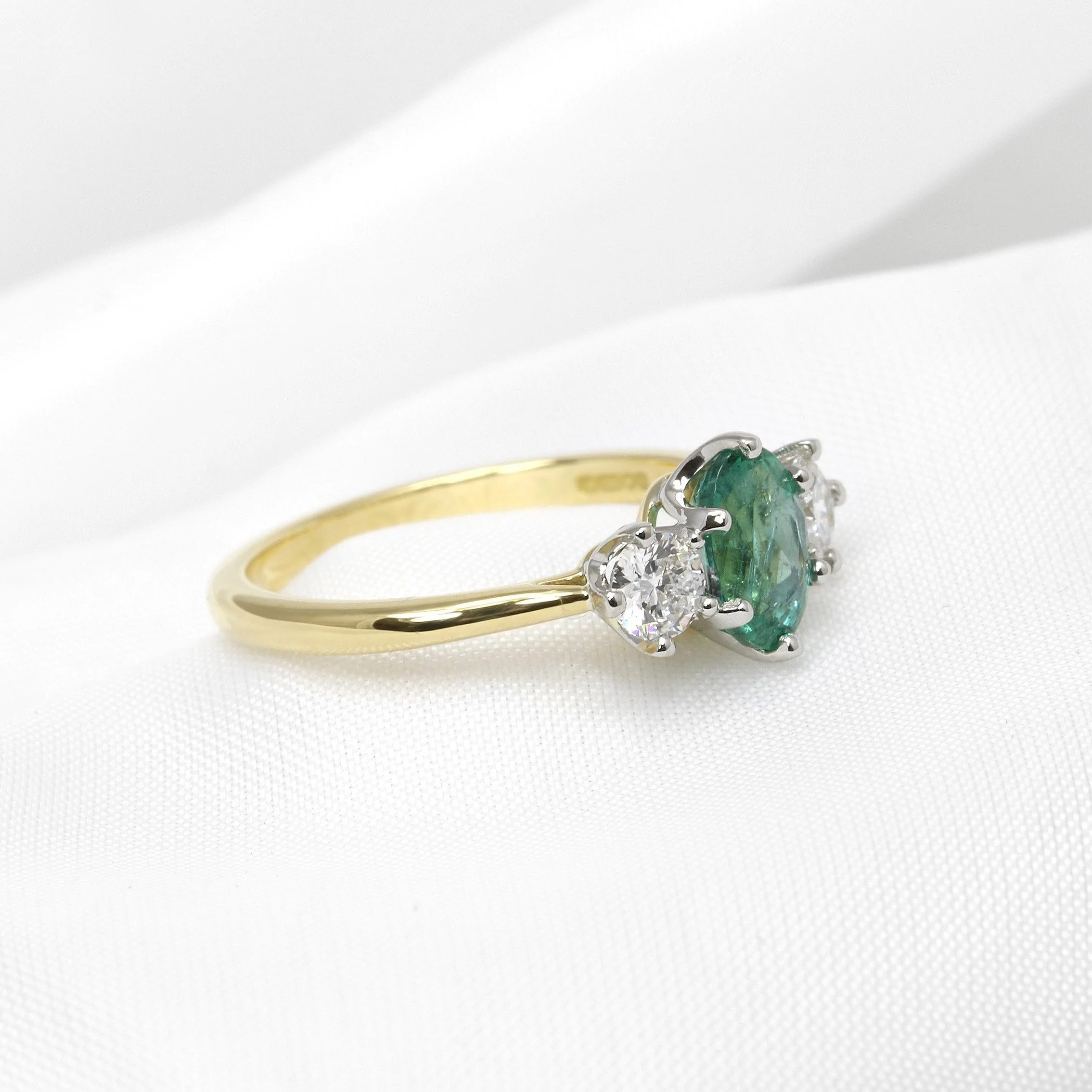 Oval Emerald and Diamond Three Stone Ring in Yellow Gold and Platinum