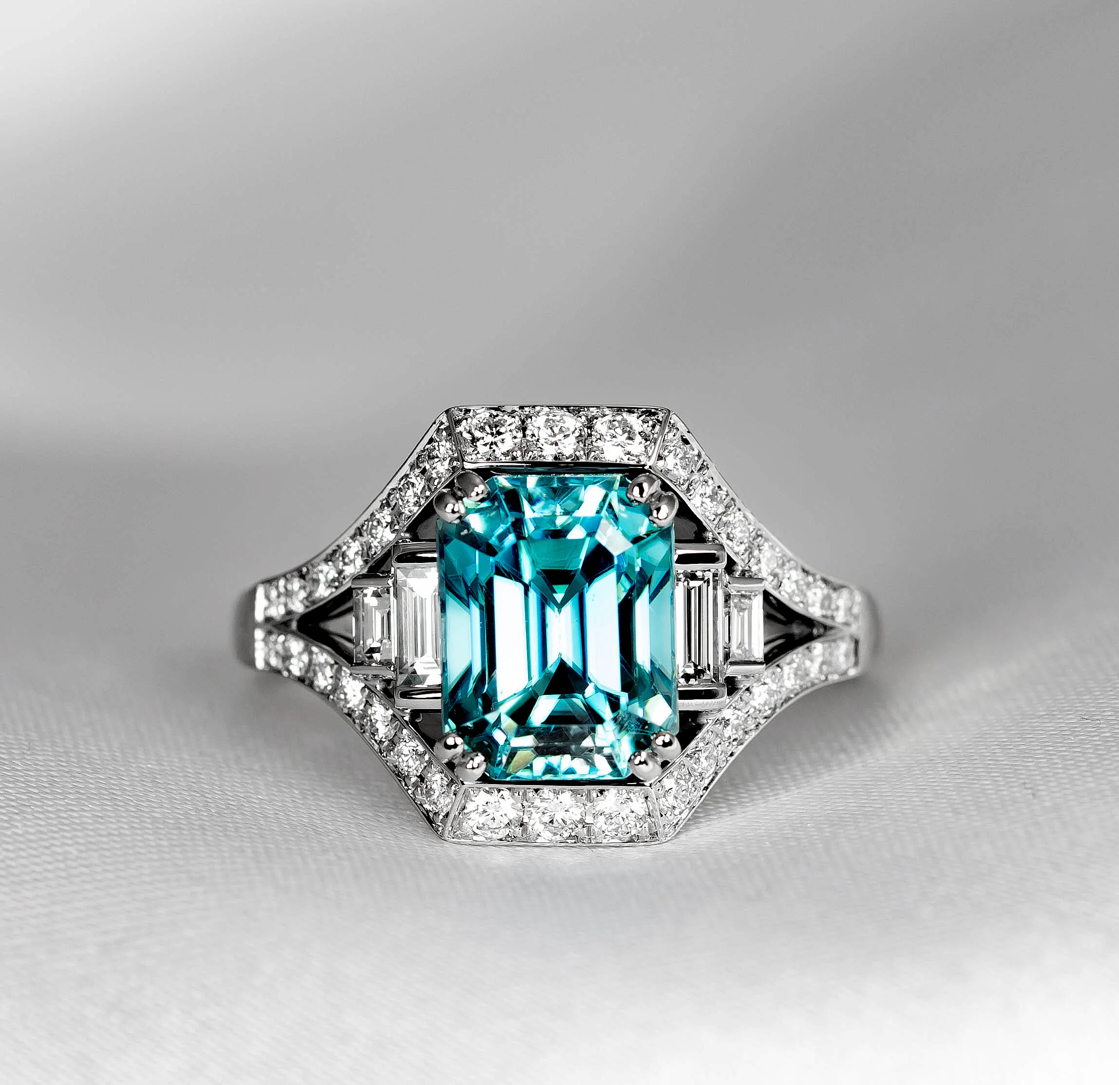   Bespoke redesign of a zircon ring using customer’s blue zircon stone and diamonds supplied by Timothy Roe  