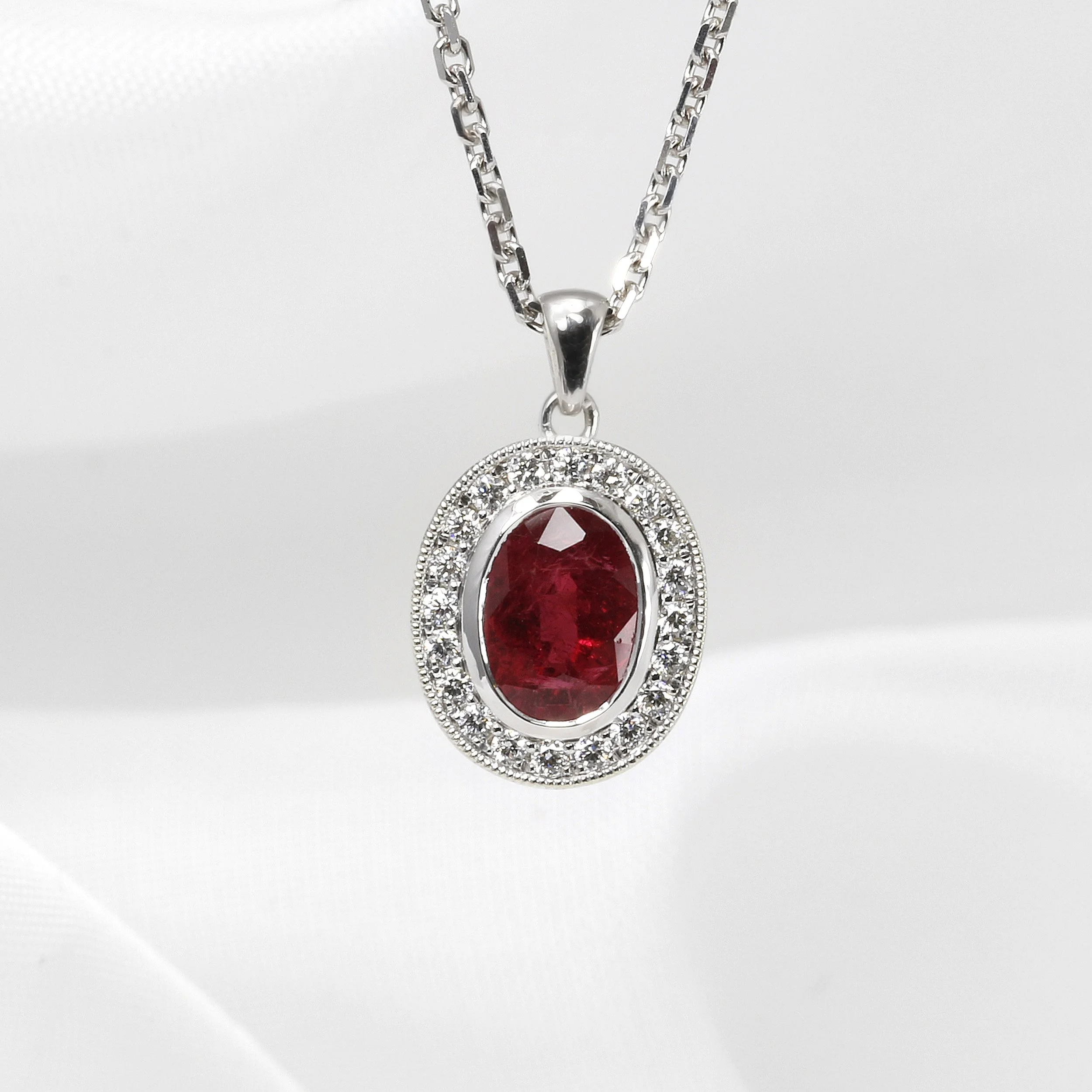  NEW! Timothy Roe Ruby and Diamond Halo Pendant in White Gold £1,995.00 