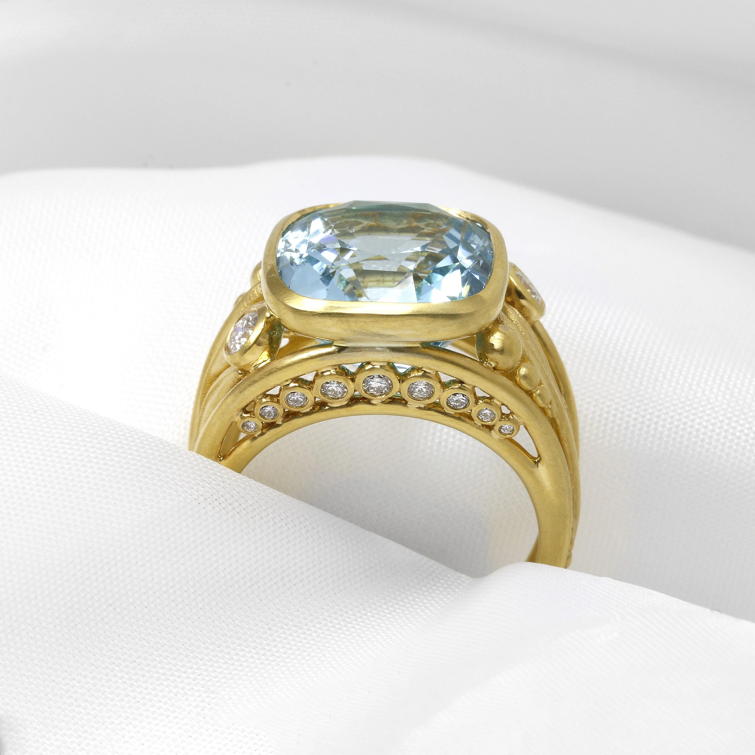 Blue Topaz and Diamond Foliate Dress Ring in 9ct Yellow Gold