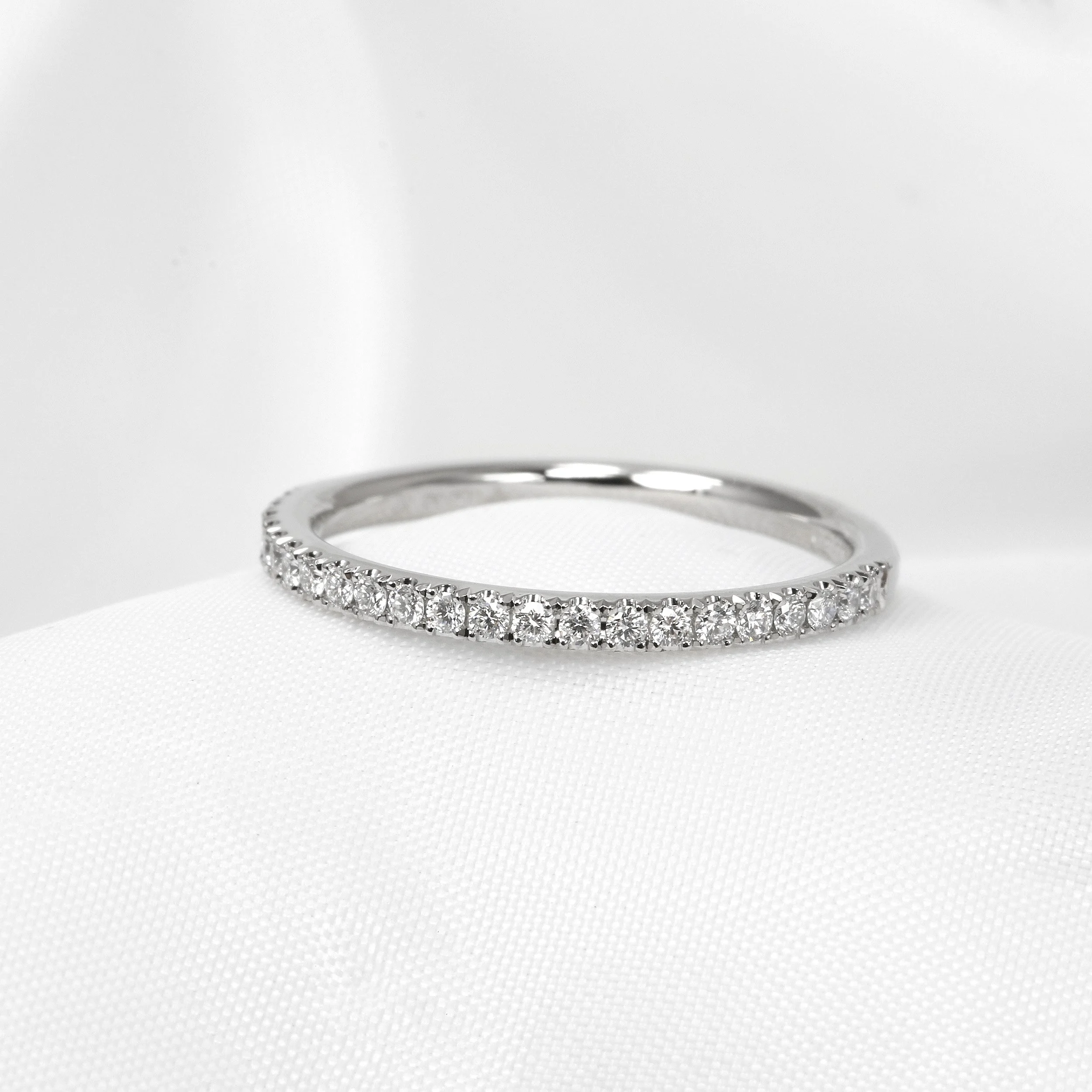 Cutaway Claw Set Diamond Half Eternity Ring in Platinum