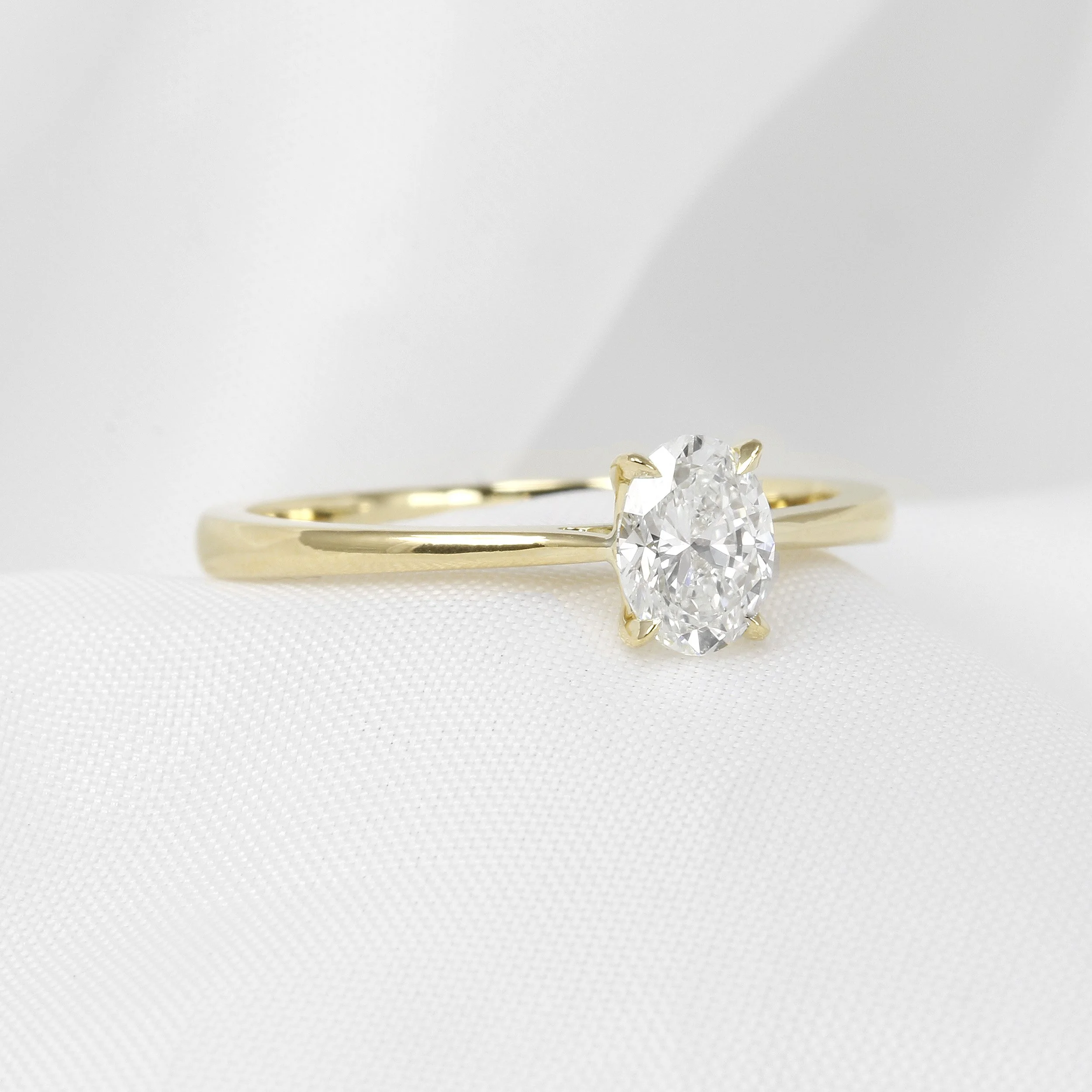  Timothy Roe Solitaire Oval Diamond Ring in 18ct Yellow Gold £1,995.00 