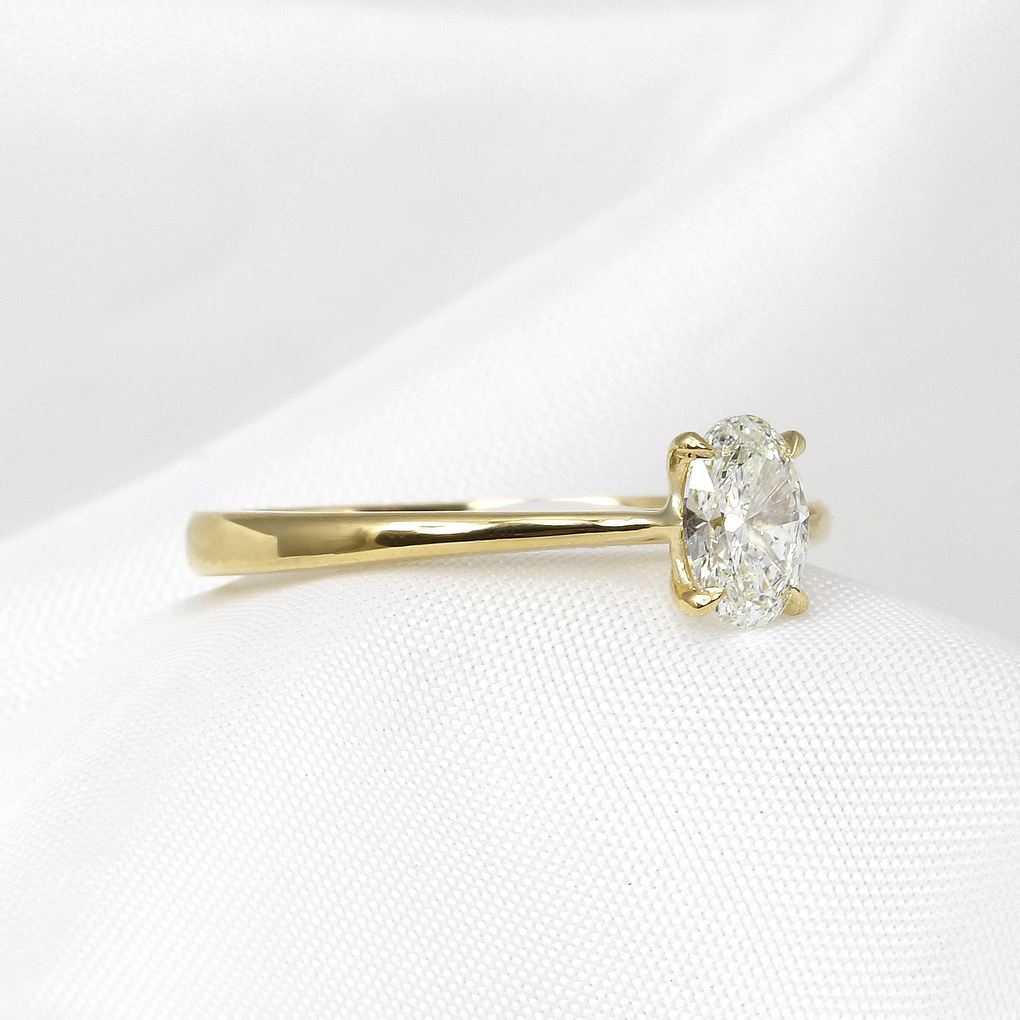 Oval Solitaire Diamond Ring in 18ct Yellow Gold