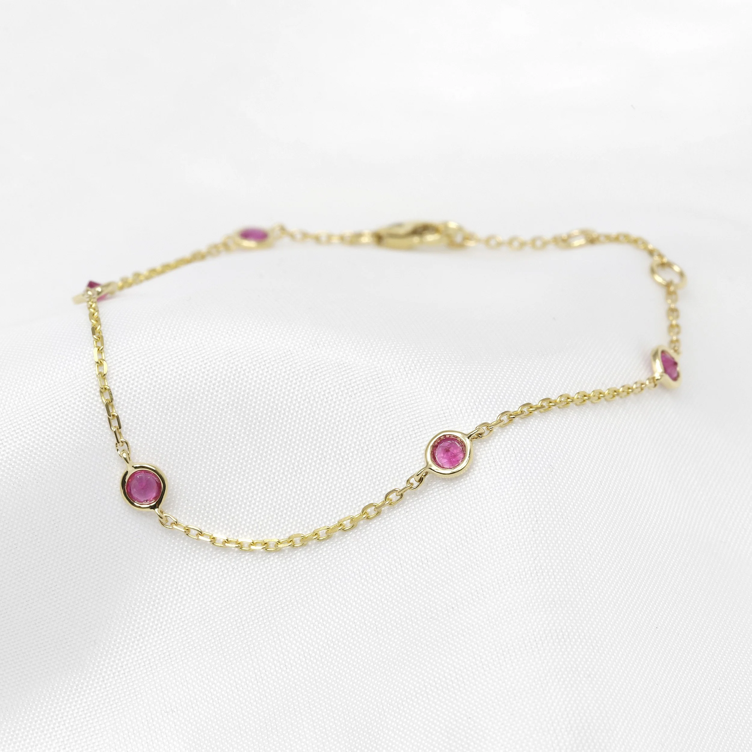  Pink Sapphire Station Bracelet in Yellow Gold £395.00 