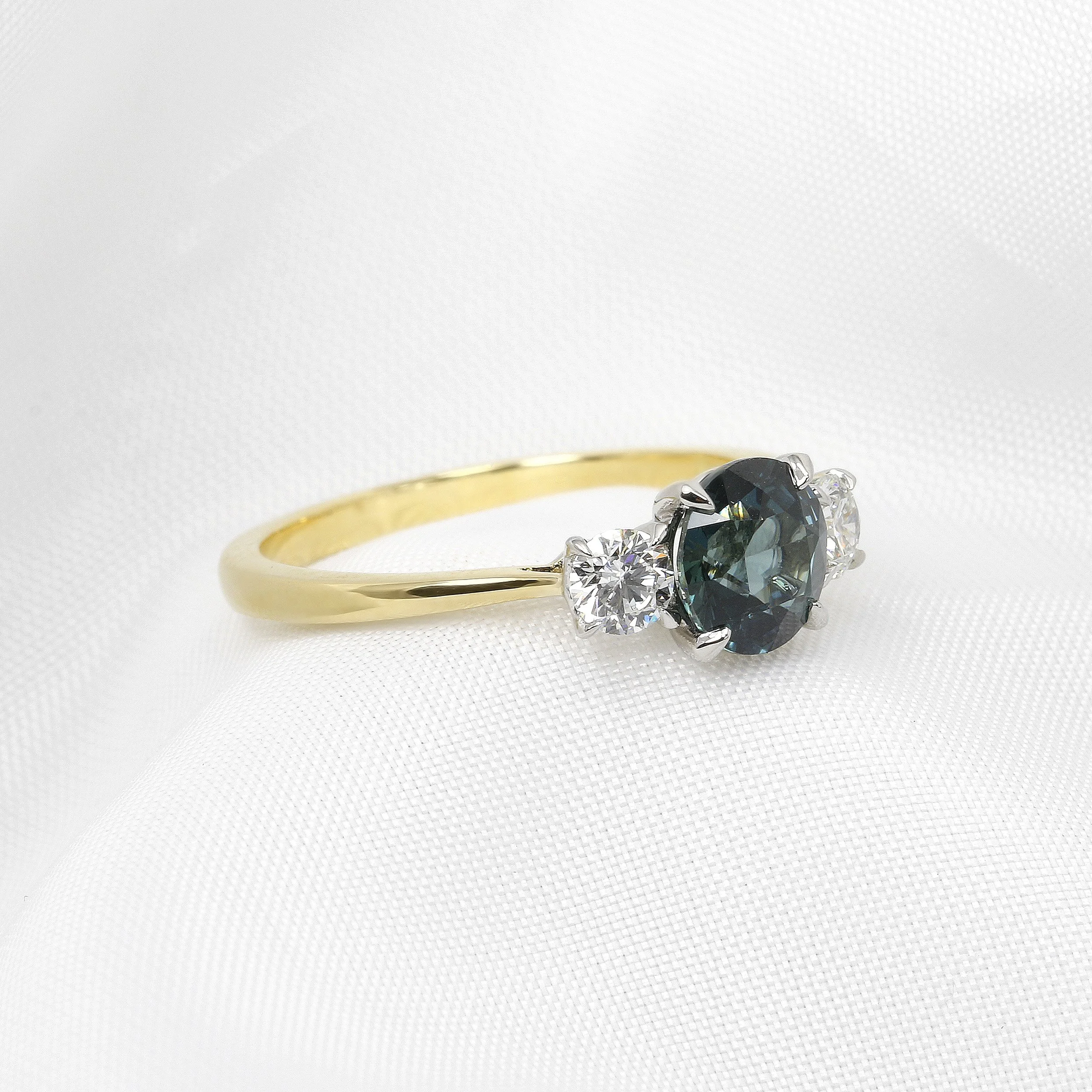 Teal Sapphire and Diamond Three Stone Ring in Platinum and 18ct Yellow Gold