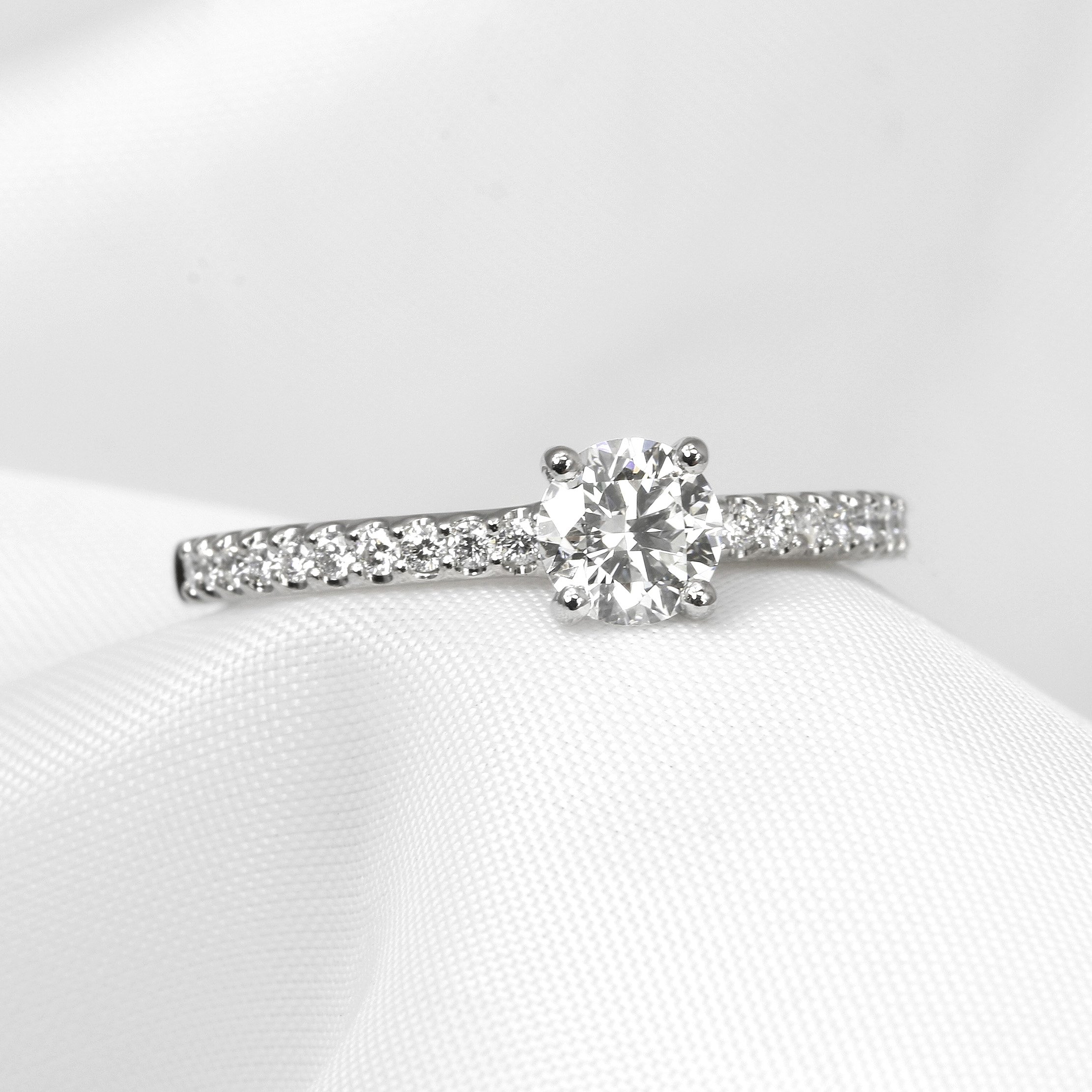 Shoulder Set Solitaire Diamond Ring in Platinum
