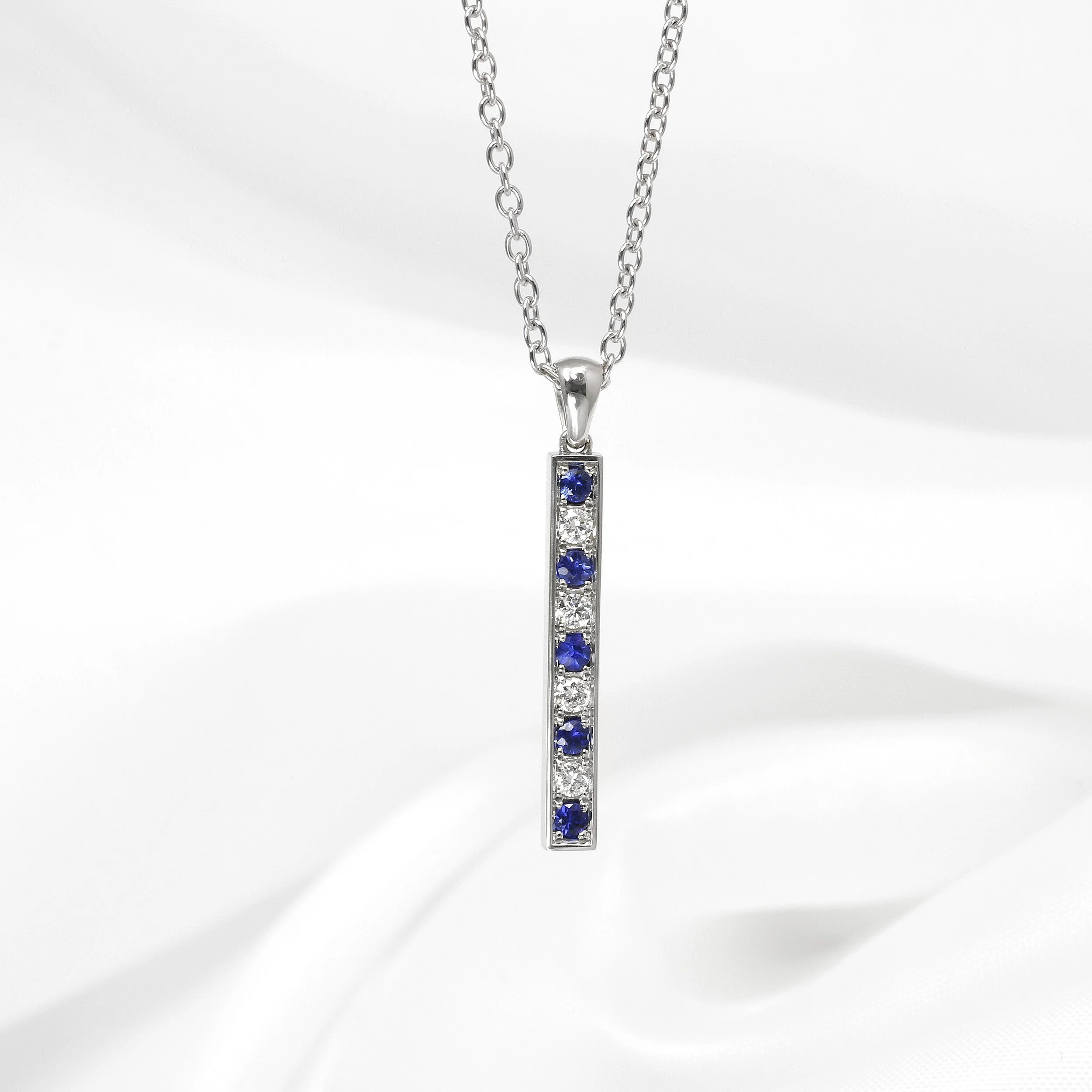 Sapphire and Diamond Drop Bar Pendant in 9ct White Gold