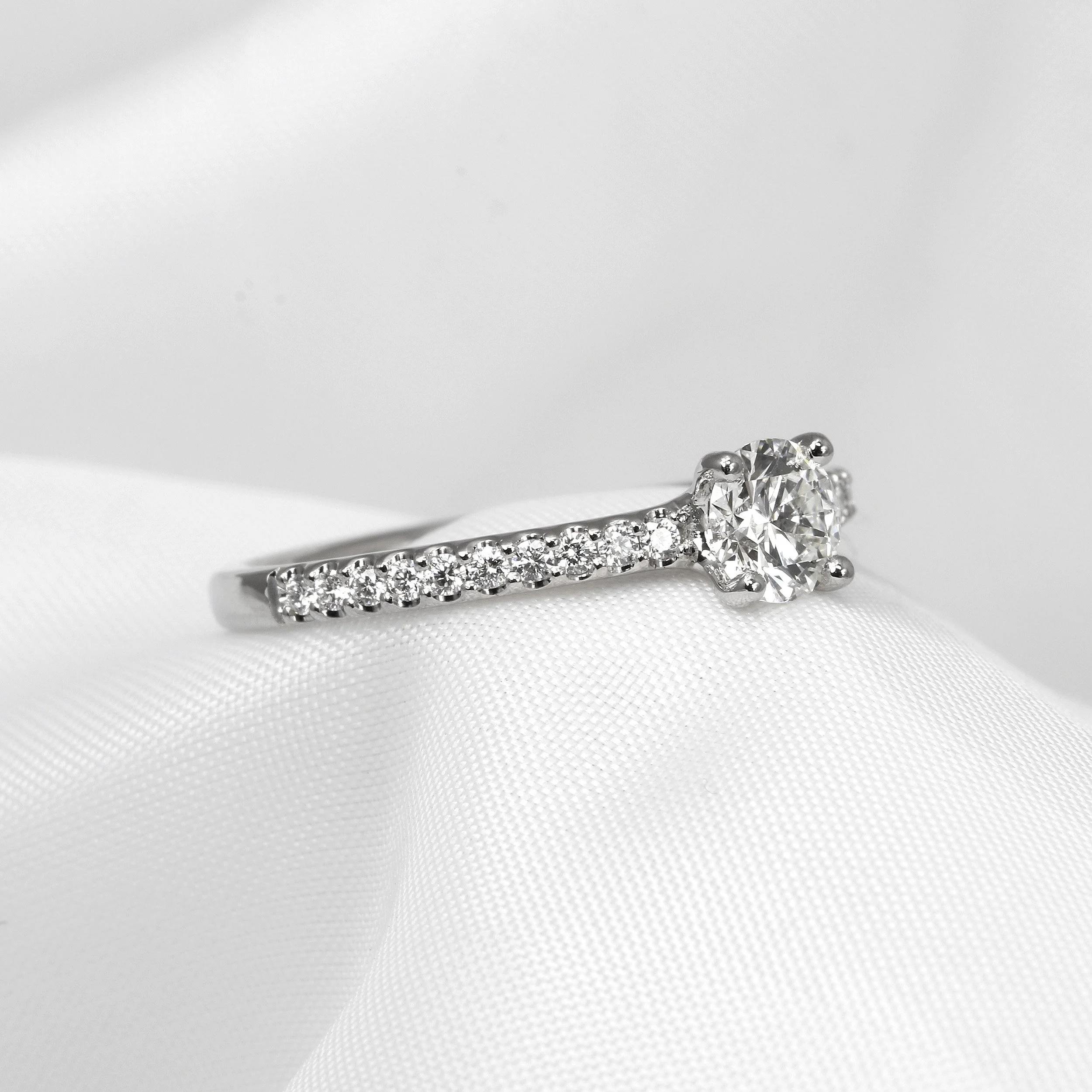 Shoulder Set Solitaire Diamond Ring in Platinum