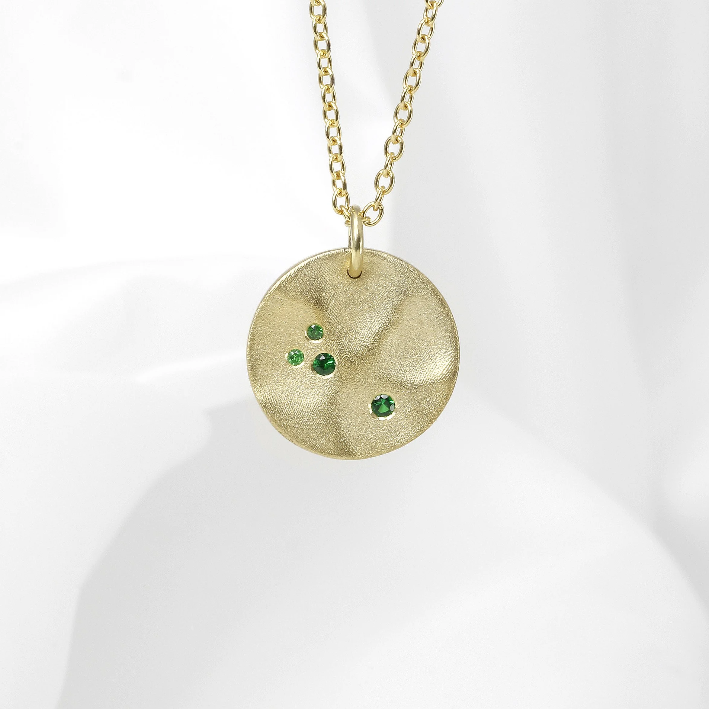  Becky’s Timothy Roe Medium Molten Disk Pendant with Tsavarite Garnets £710.00 