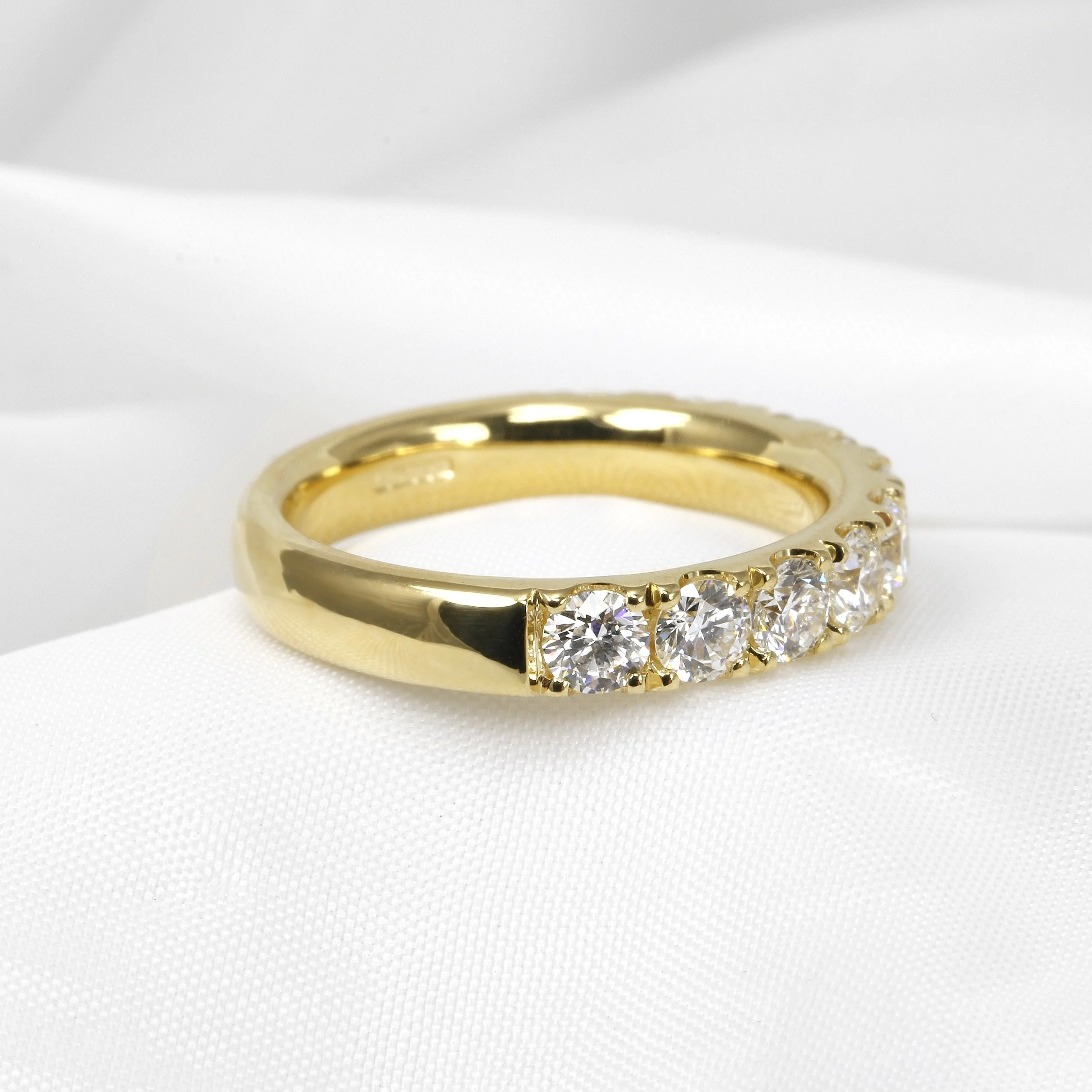 Cutaway Claw Set Diamond Eternity Ring in 18ct Yellow Gold