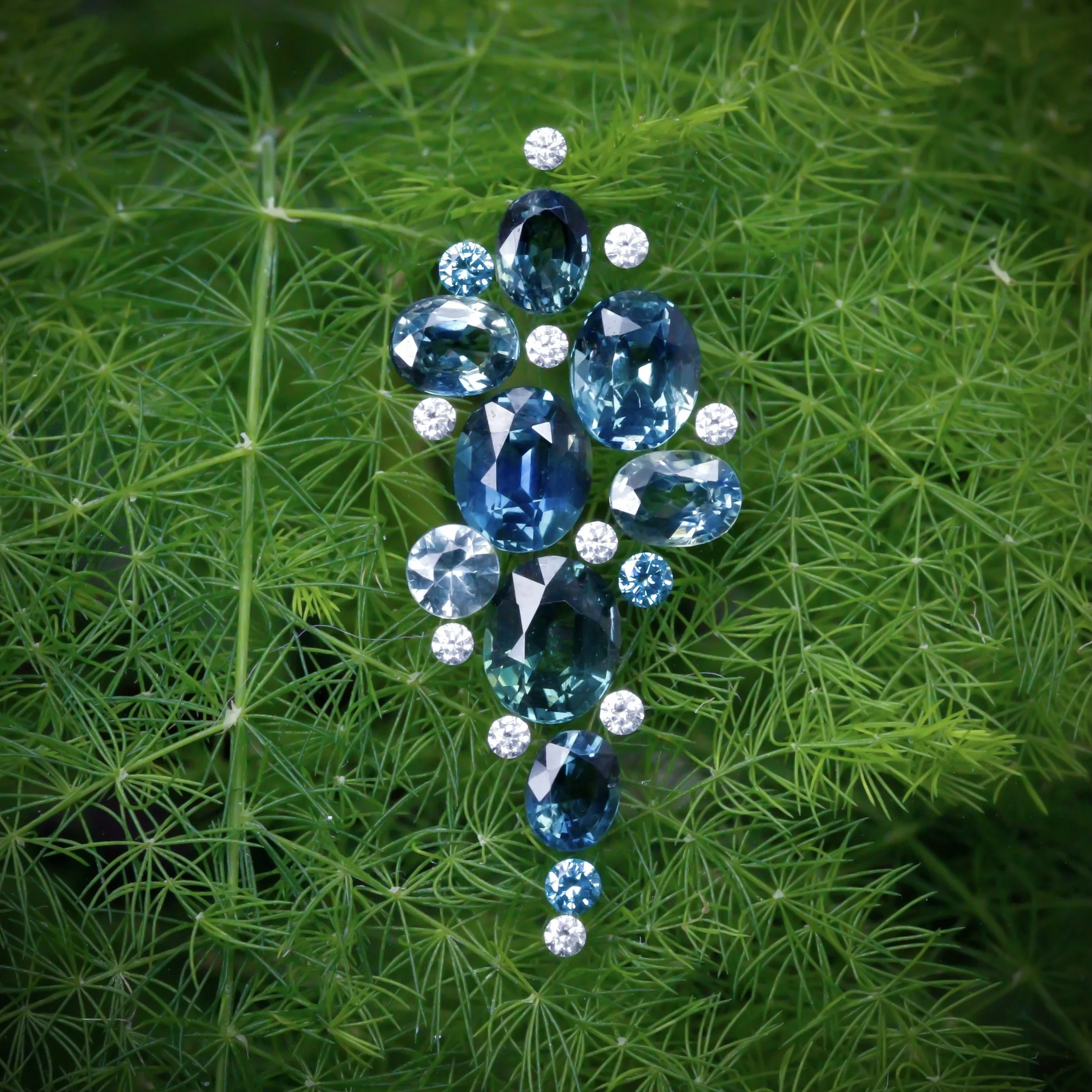 Teal Sapphire and Round Diamond (white and treated blue) selection. 5.33ct, 0.17ct and 0.12ct respectively.