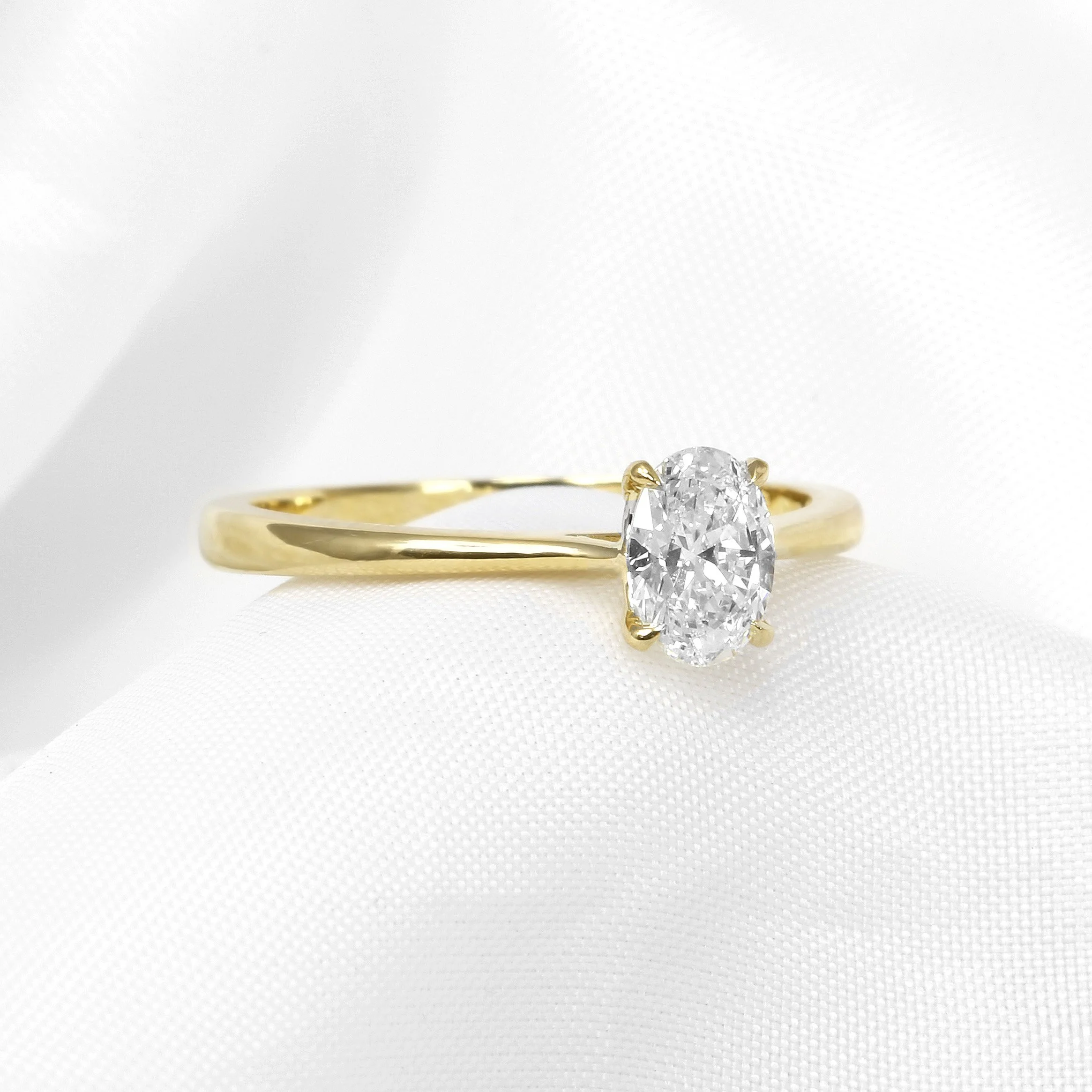 Oval Solitaire Diamond Ring in 18ct Yellow Gold