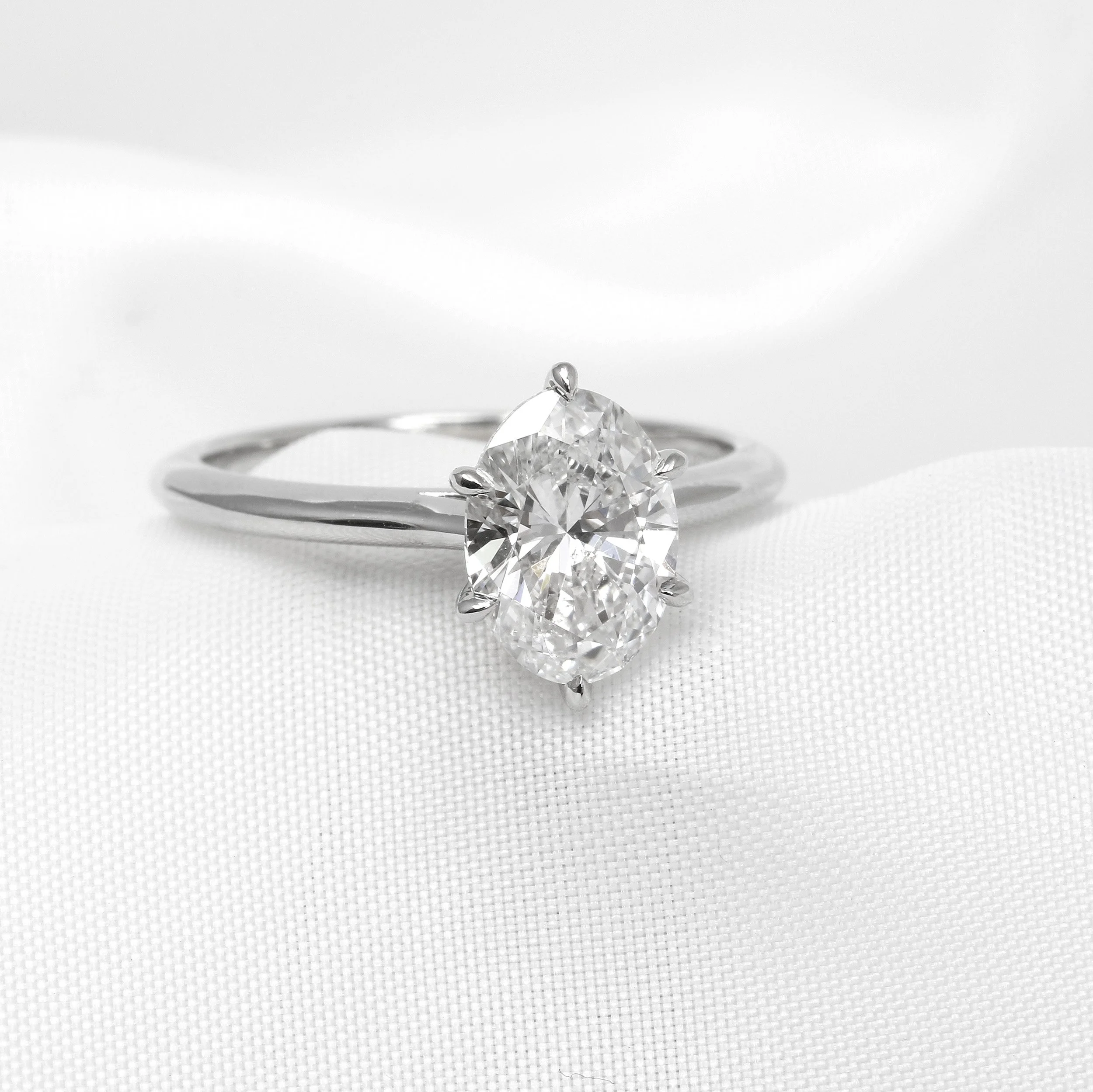  Oval Solitare Diamond Ring in Platinum £14,495.00 