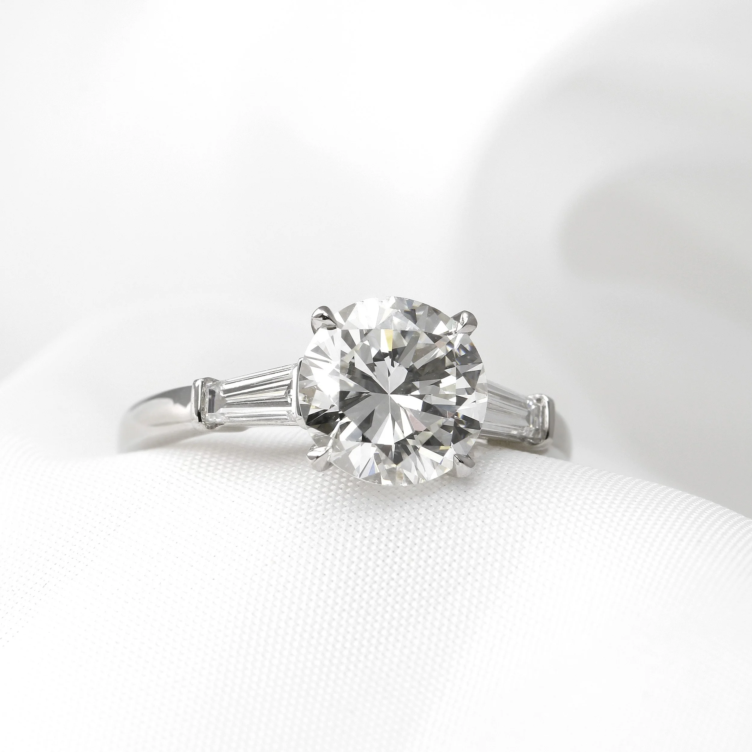  Timothy Roe Solitaire Diamond Ring with Baguette Shoulders in Platinum £29,995.00 