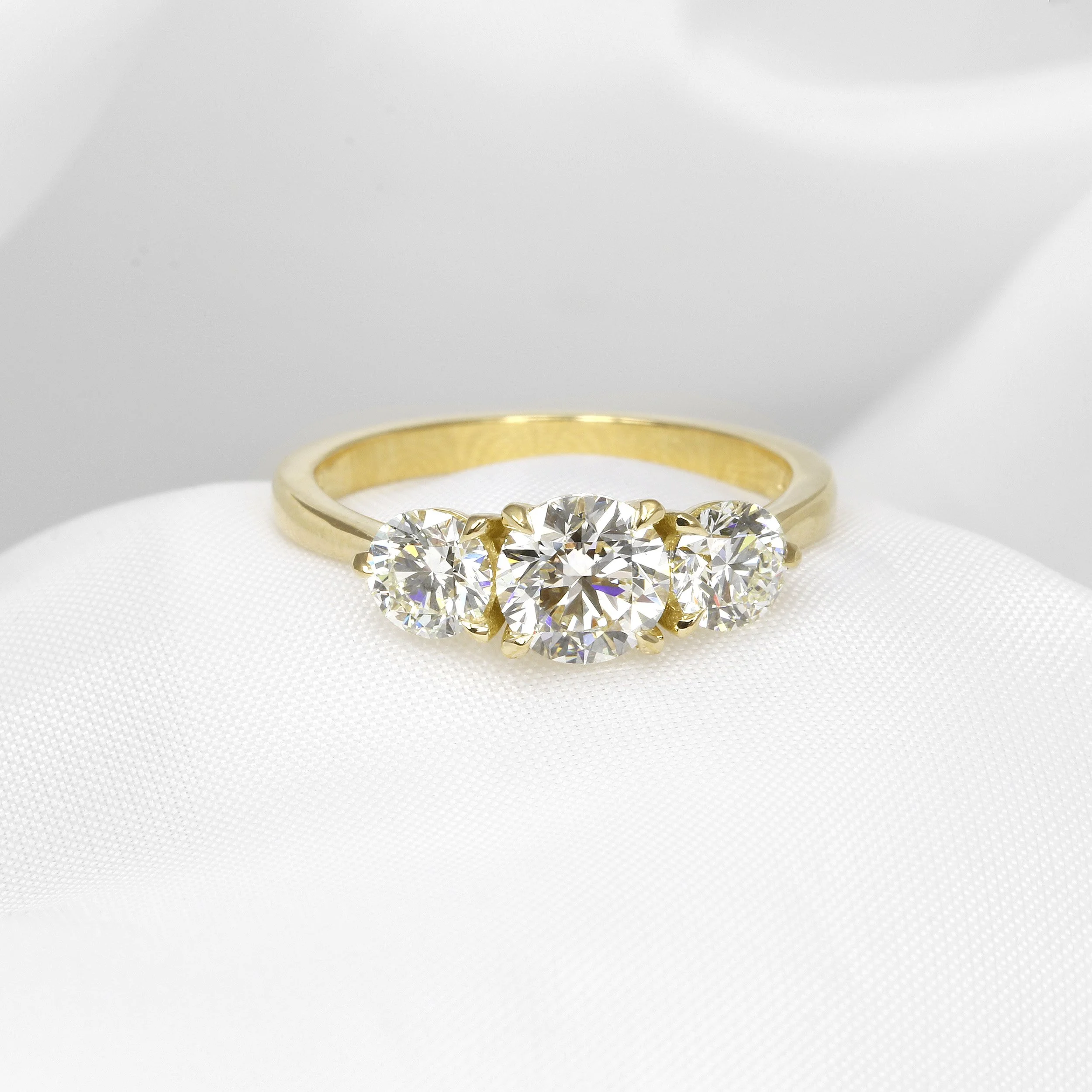  Timothy Roe Diamond Three Stone Ring in 18ct Yellow Gold £4,850.00 