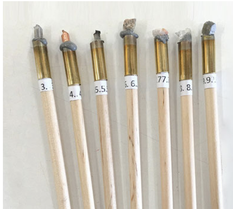  Mohs Hardness Pencils. These pencils tipped with different mineral materials are used to perform a scratch test on materials to determine the hardness of the surfaces. These are used in the field on rough crystals not faceted and polished stones.  